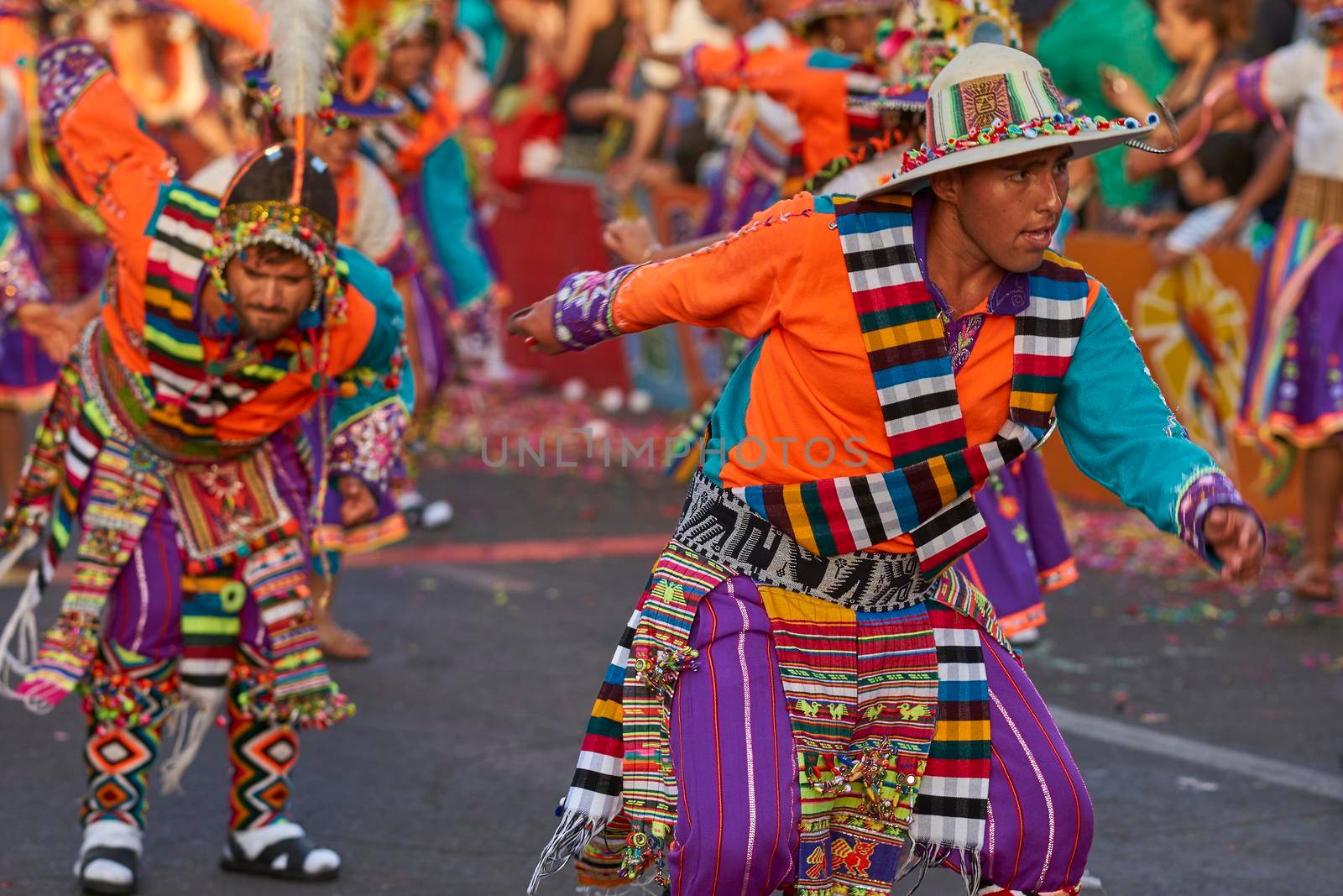 Arica, Chile - January 23, 2016: Tinkus dancing group in colourful costumes performing a traditional ritual dance as part of the Carnaval Andino con la Fuerza del Sol in Arica, Chile.