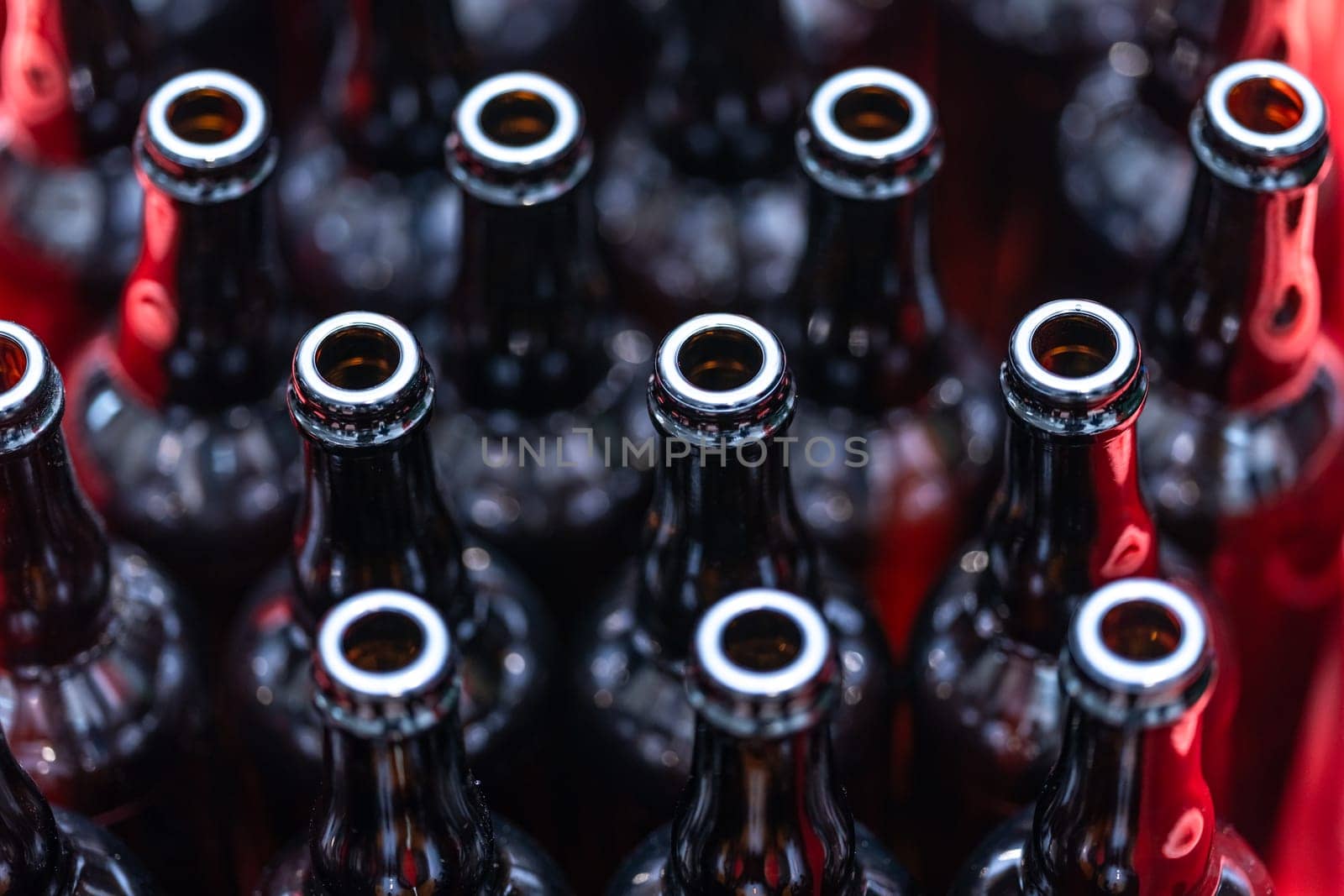 empty glass drink bottles in stock. High quality photo