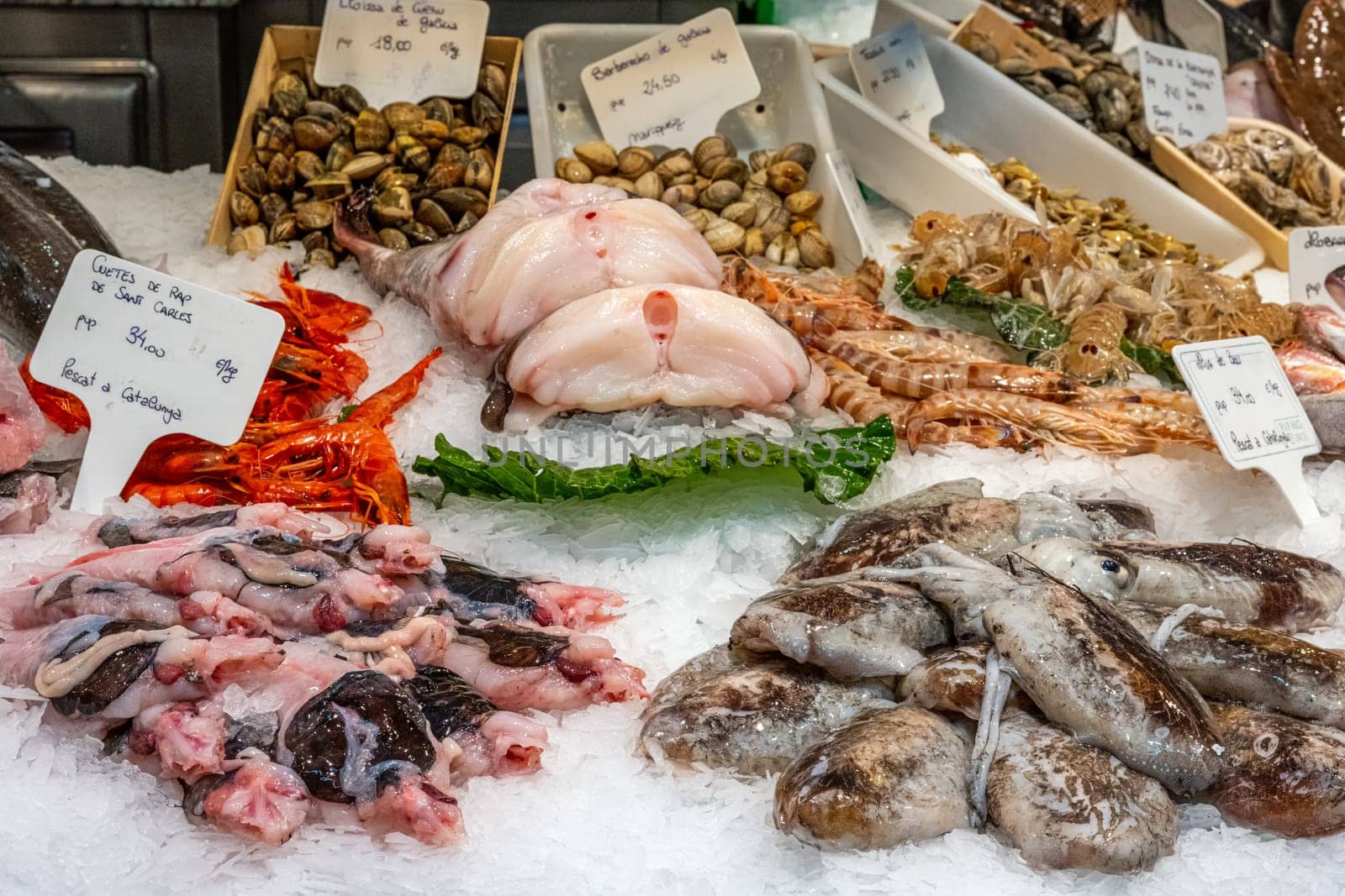 Market stall with fresh fish and seafood seen in Barcelona, Spain
