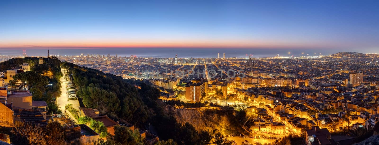 Panorama of Barcelona before sunrise by elxeneize