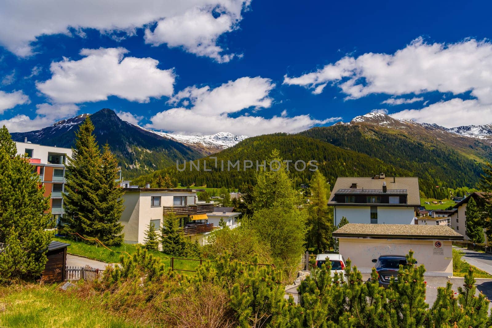Houses in town village in Alps mountains, Davos, Graubuenden, Switzerland.