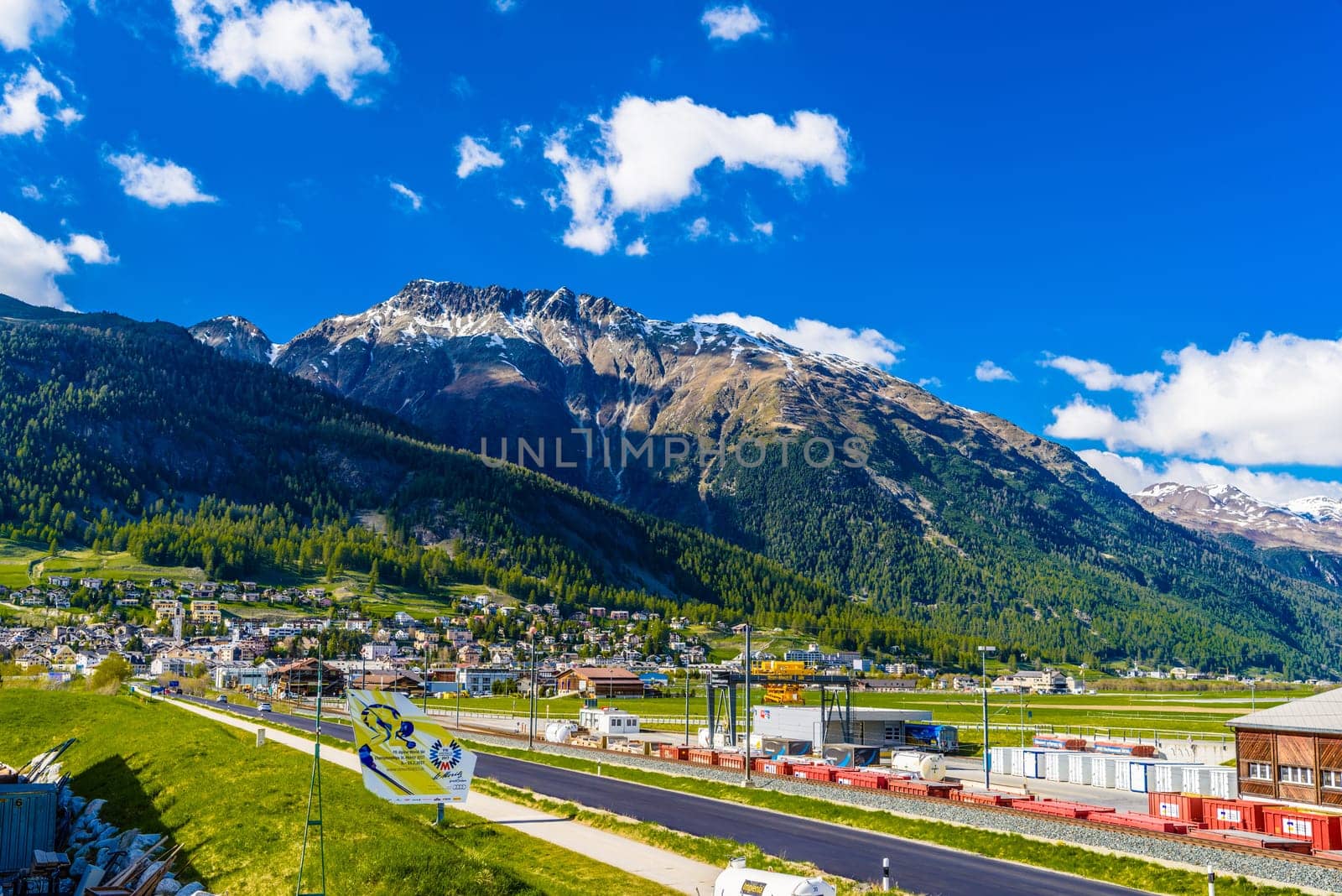 SWITZERLAND, DAVOS - MAI 2017: Road with Alps mountains, Samedan, Maloja Graubuenden Switzerland.