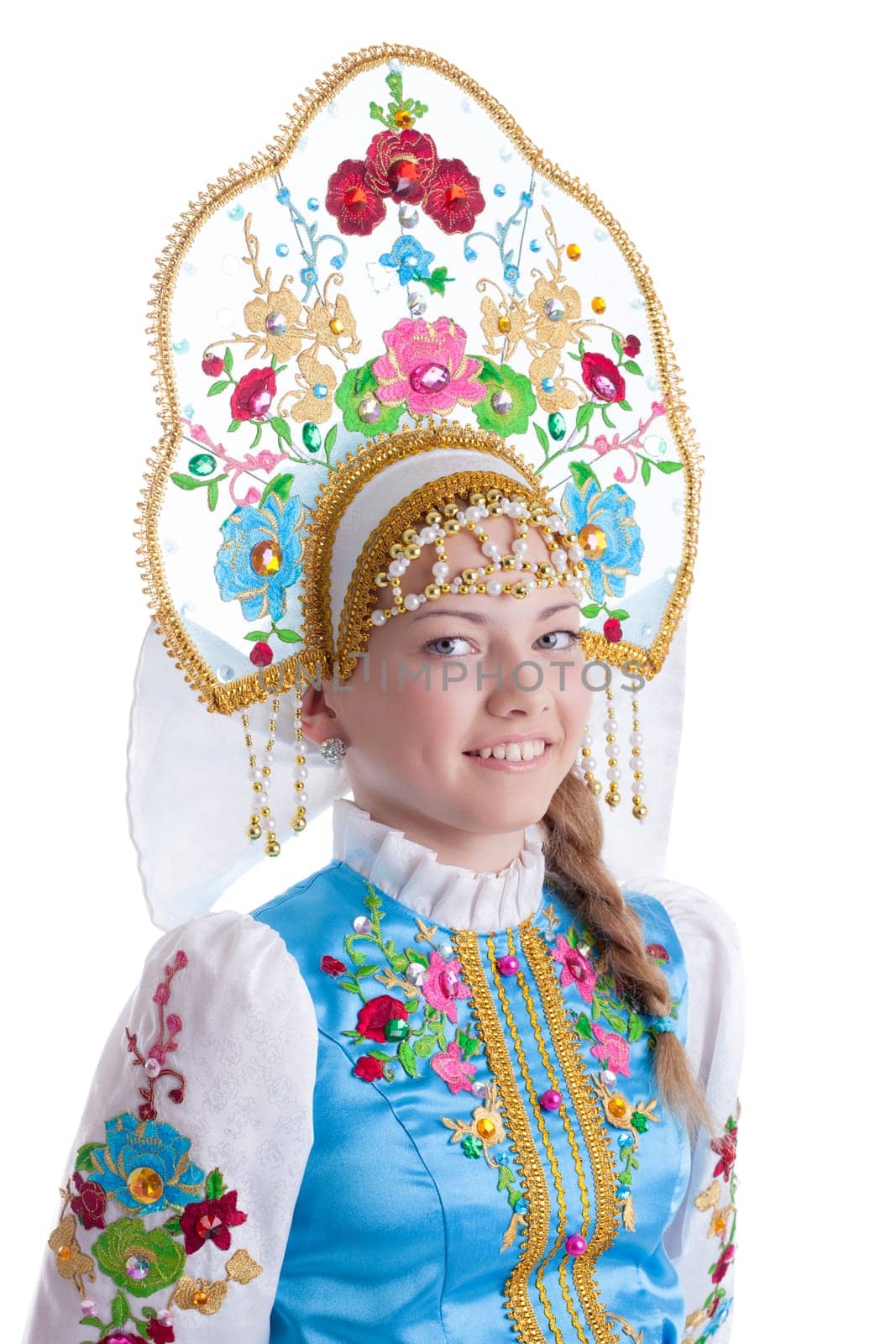 Pretty girl in blue russian costume. Isolated on white