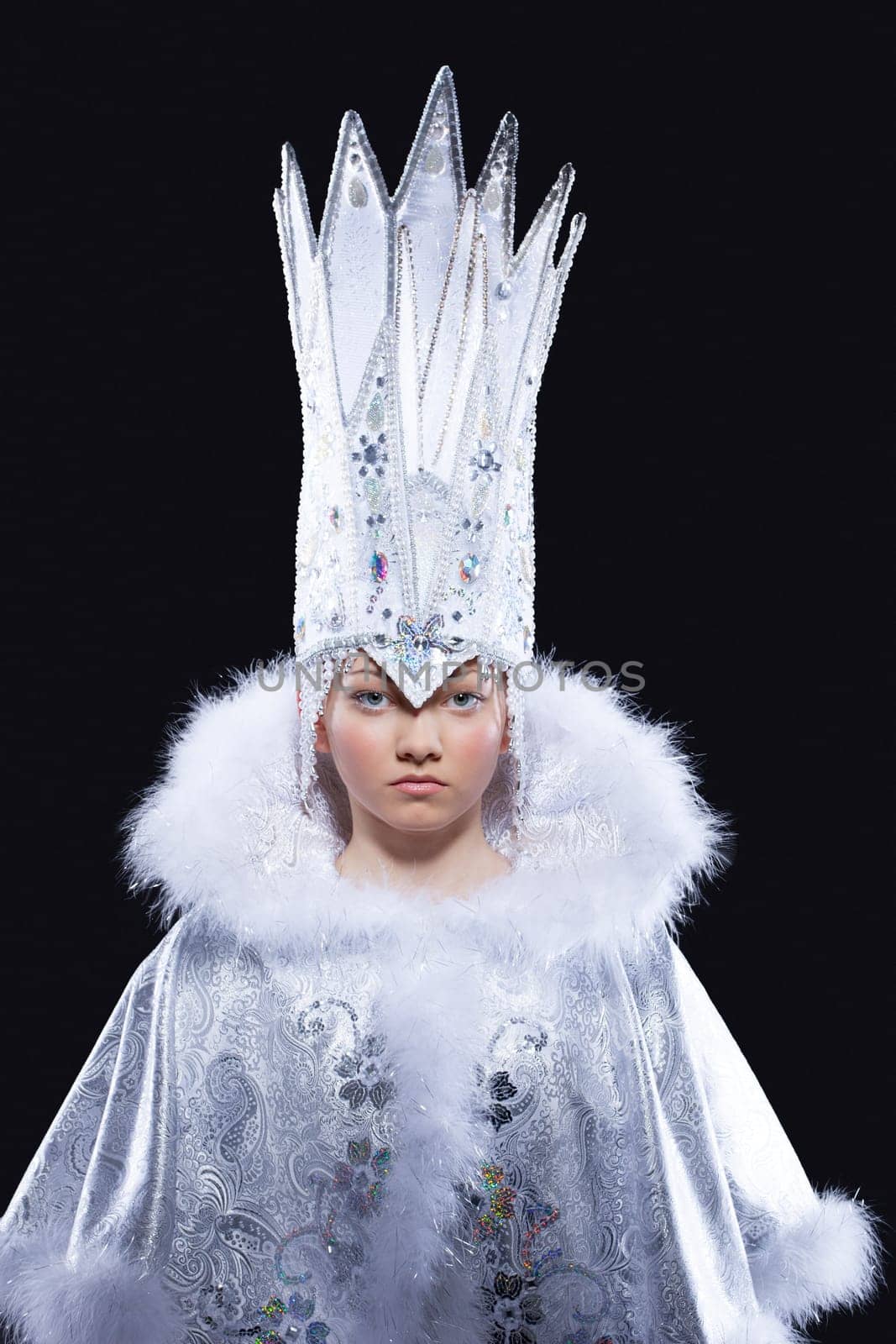 portrait of pretty girl in ice queen carnival costume