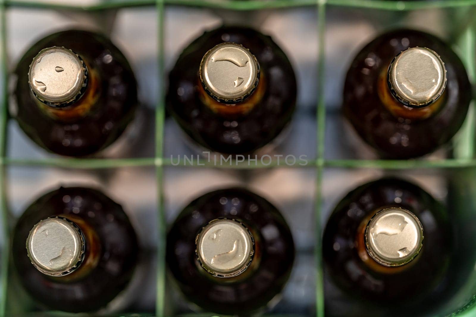 drinking glass bottles in crates in stock by Edophoto