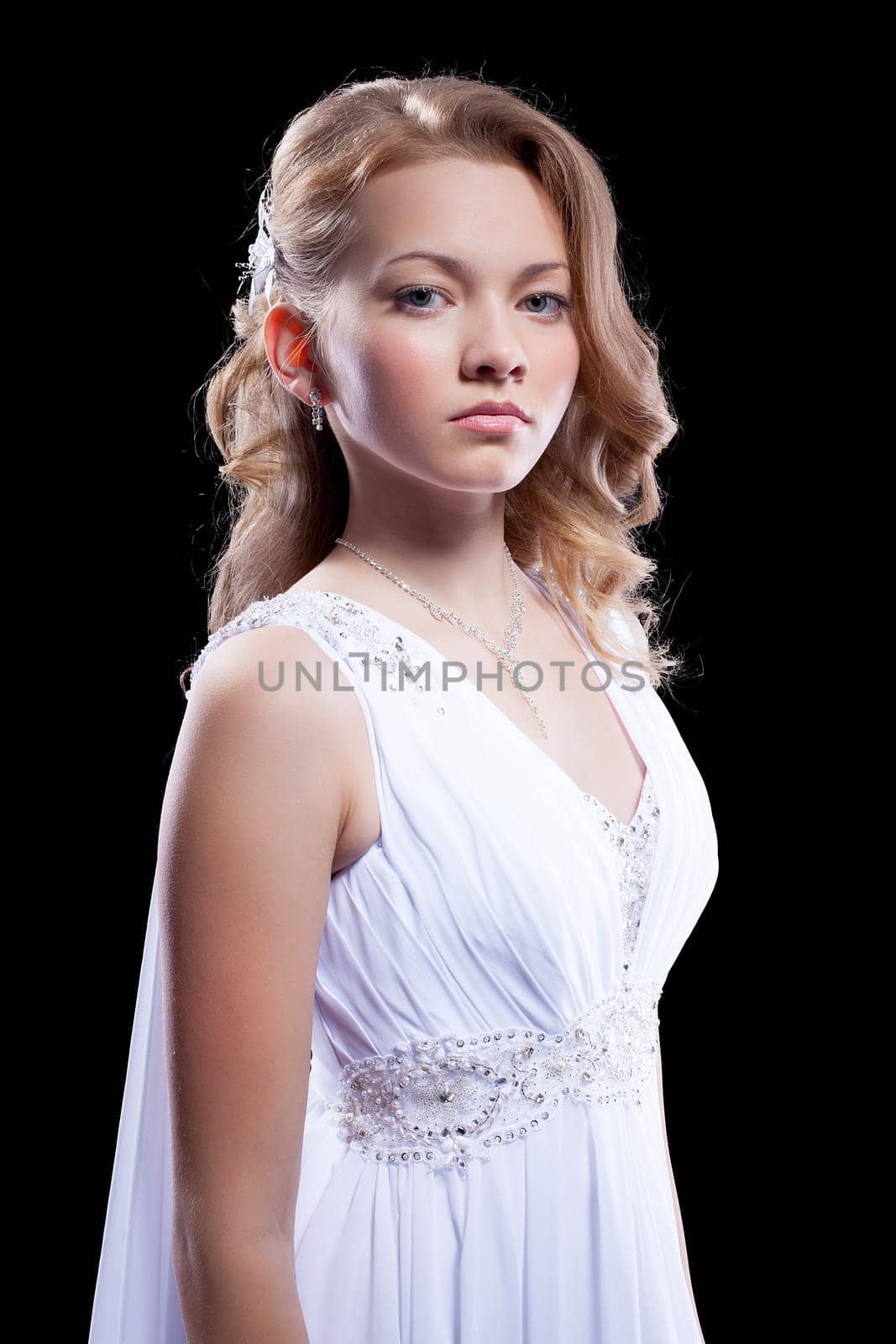 Full length portrait of young woman in beautiful long fashion dress