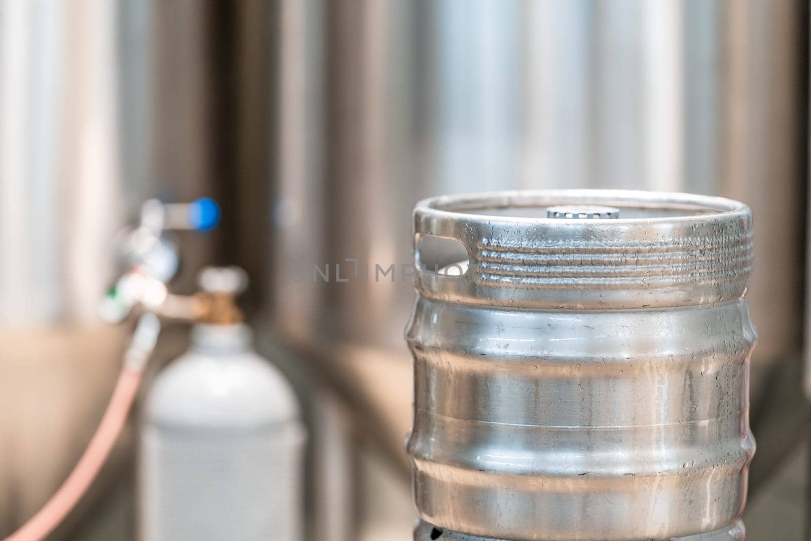 aluminium beer barrel in a brewery. High quality photo