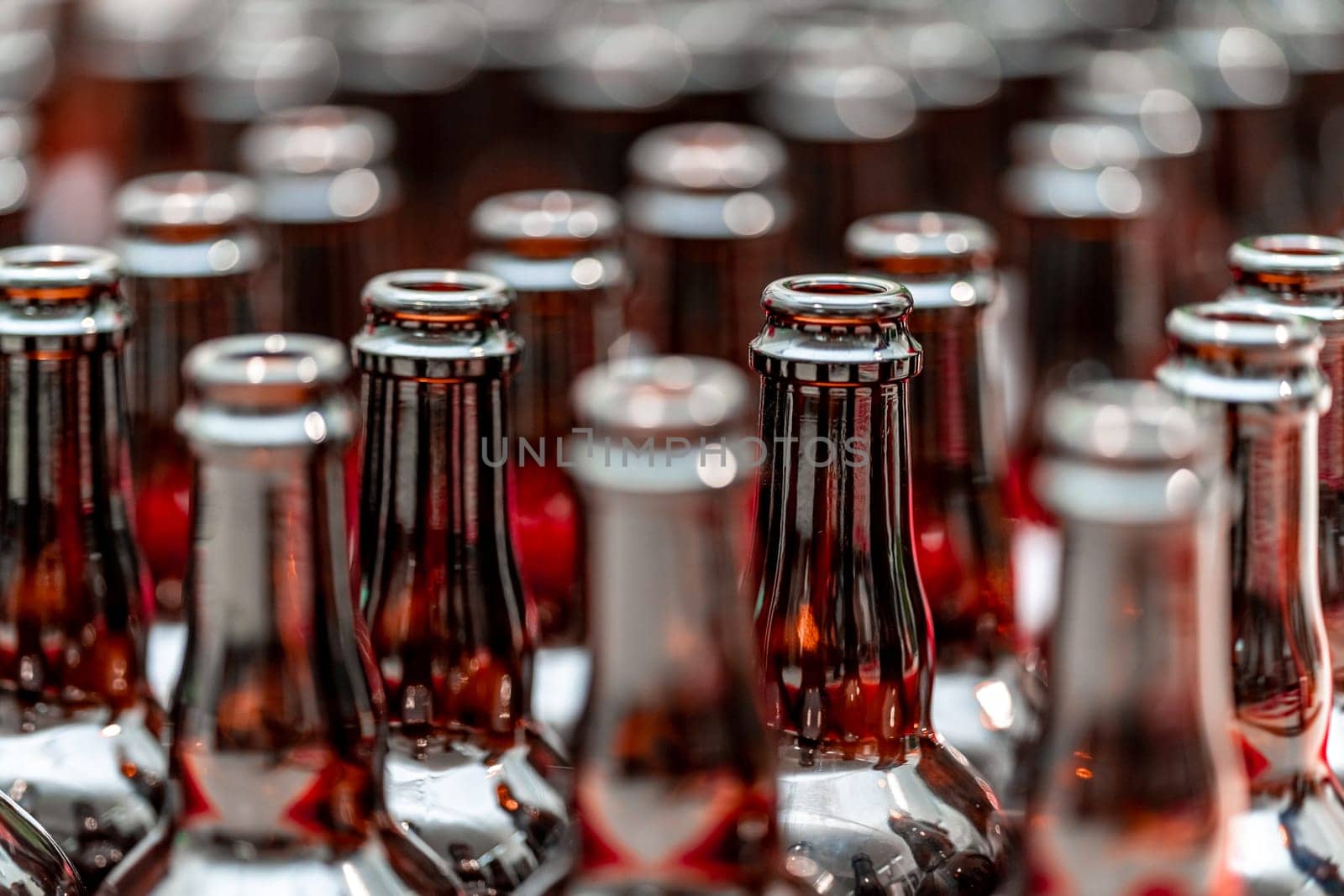 empty glass beer bottles in brewery. High quality photo