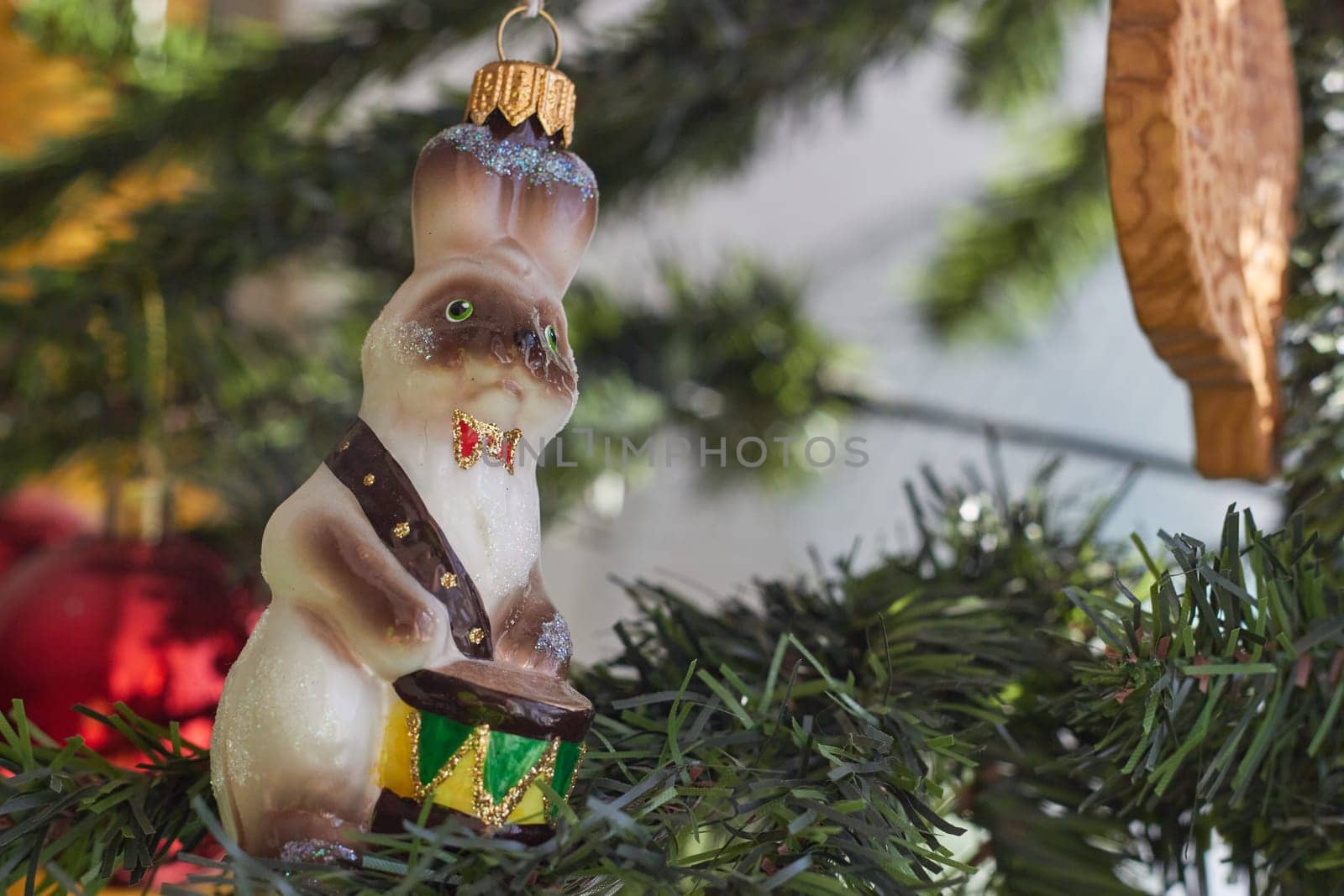 A glass Christmas tree toy hare with drum by electrovenik