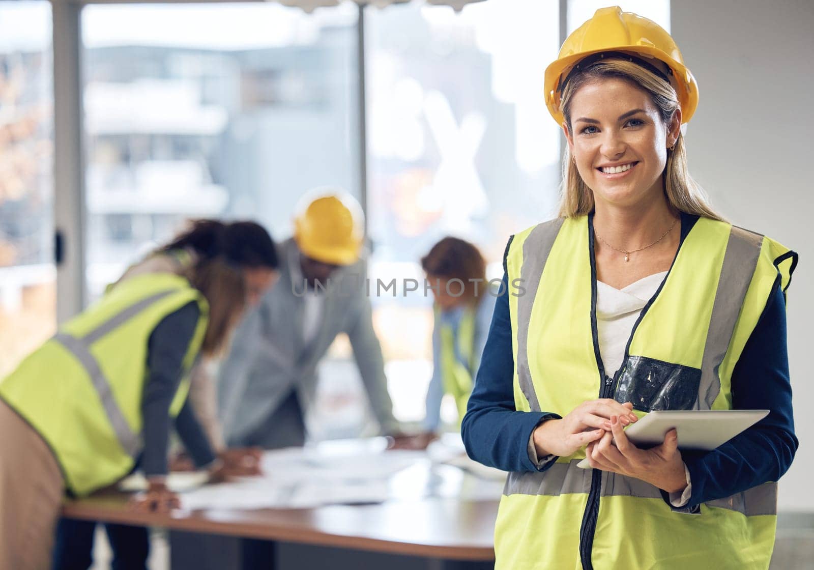 Woman, architect and tablet in leadership for meeting, construction or planning architecture at office. Portrait of happy female engineer with touchscreen for industrial team management at workplace by YuriArcurs