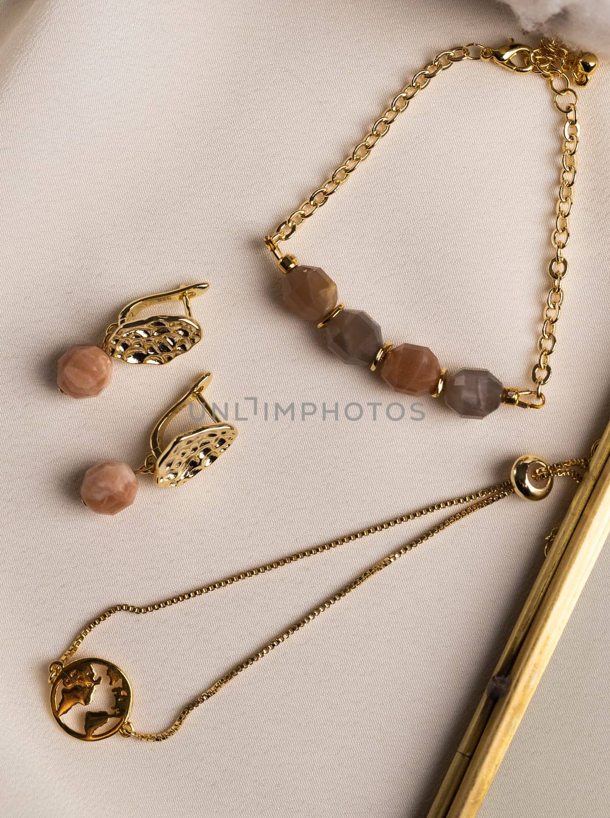 Bracelets made of natural stones. natural mineral texture of the necklace. The background is blurred. not everything is in focus.
