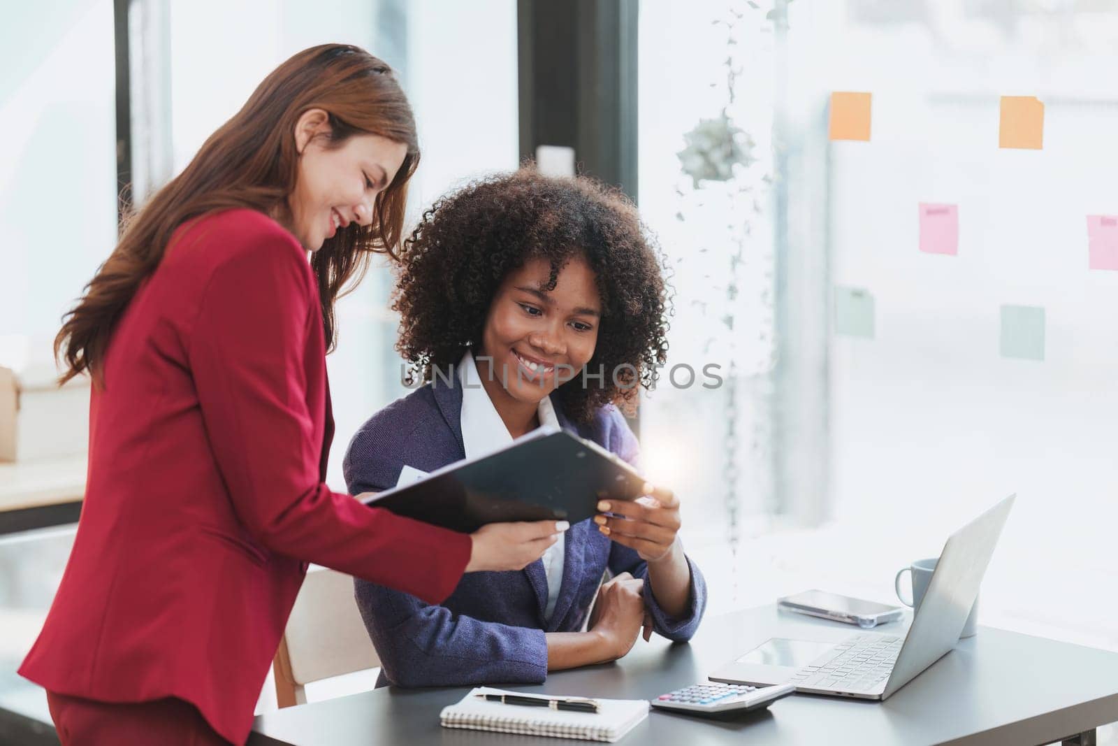 Multiethnic business people in meeting. Accountant people do document, tax, exchange, accounting and Financial advisor concept.