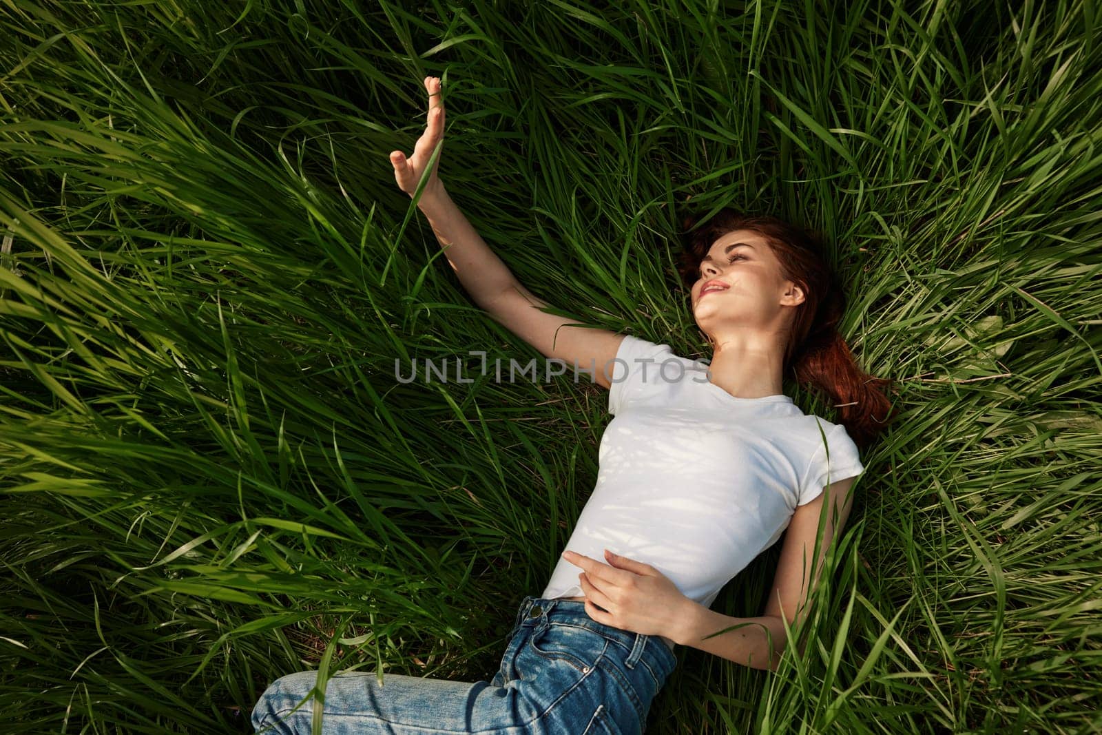 woman resting in the grass. High quality photo