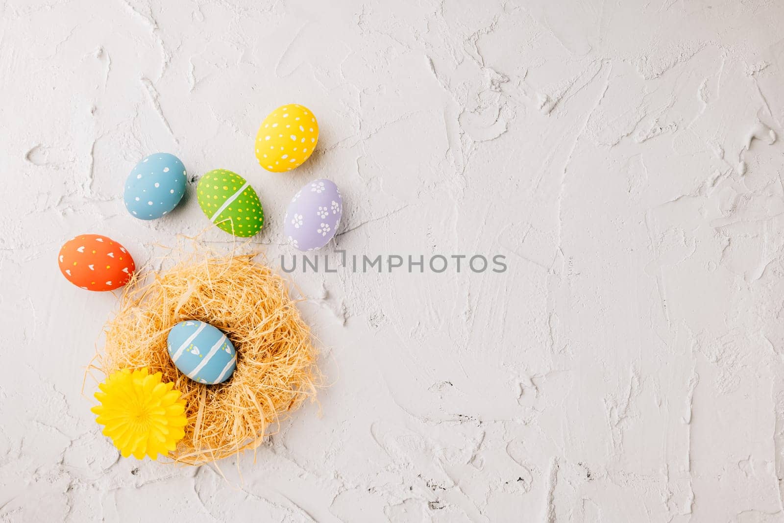 Top view holiday banner background web design white easter eggs in brown nest on white cement background with empty copy space, celebration greeting card, overhead, template, Happy Easter Day Concept