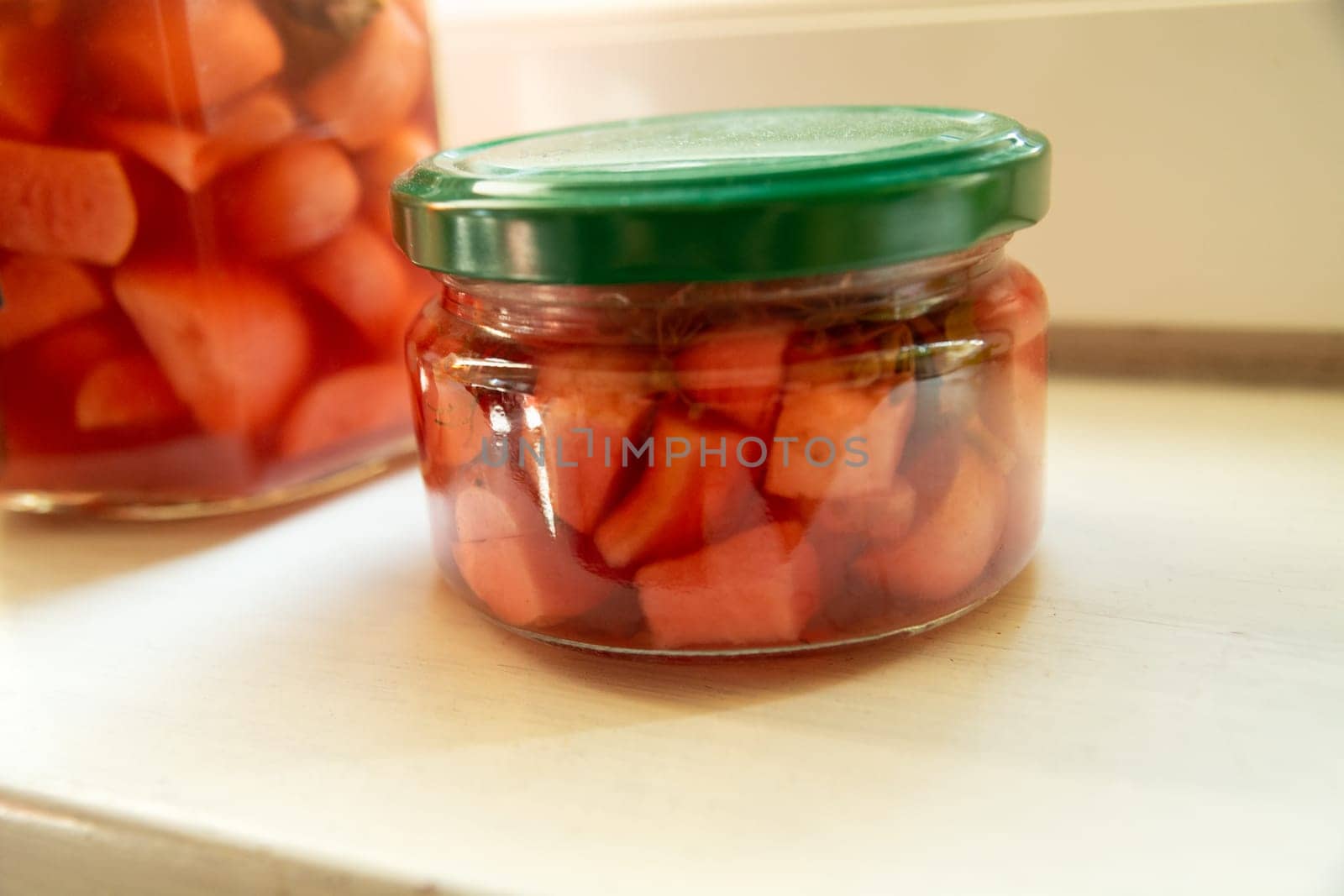 Pickled garlic in a small jar, autumn stock