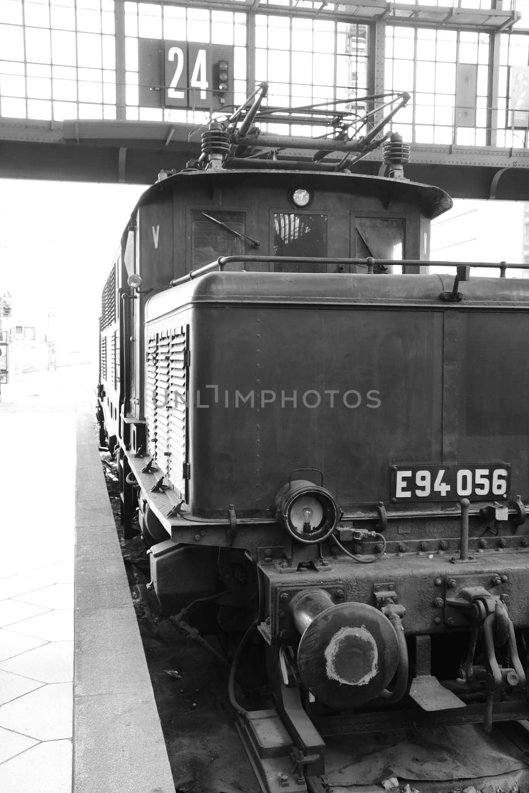 Vertical shot of a historic traditional locomotive at the museum station in Leipzig, Germany