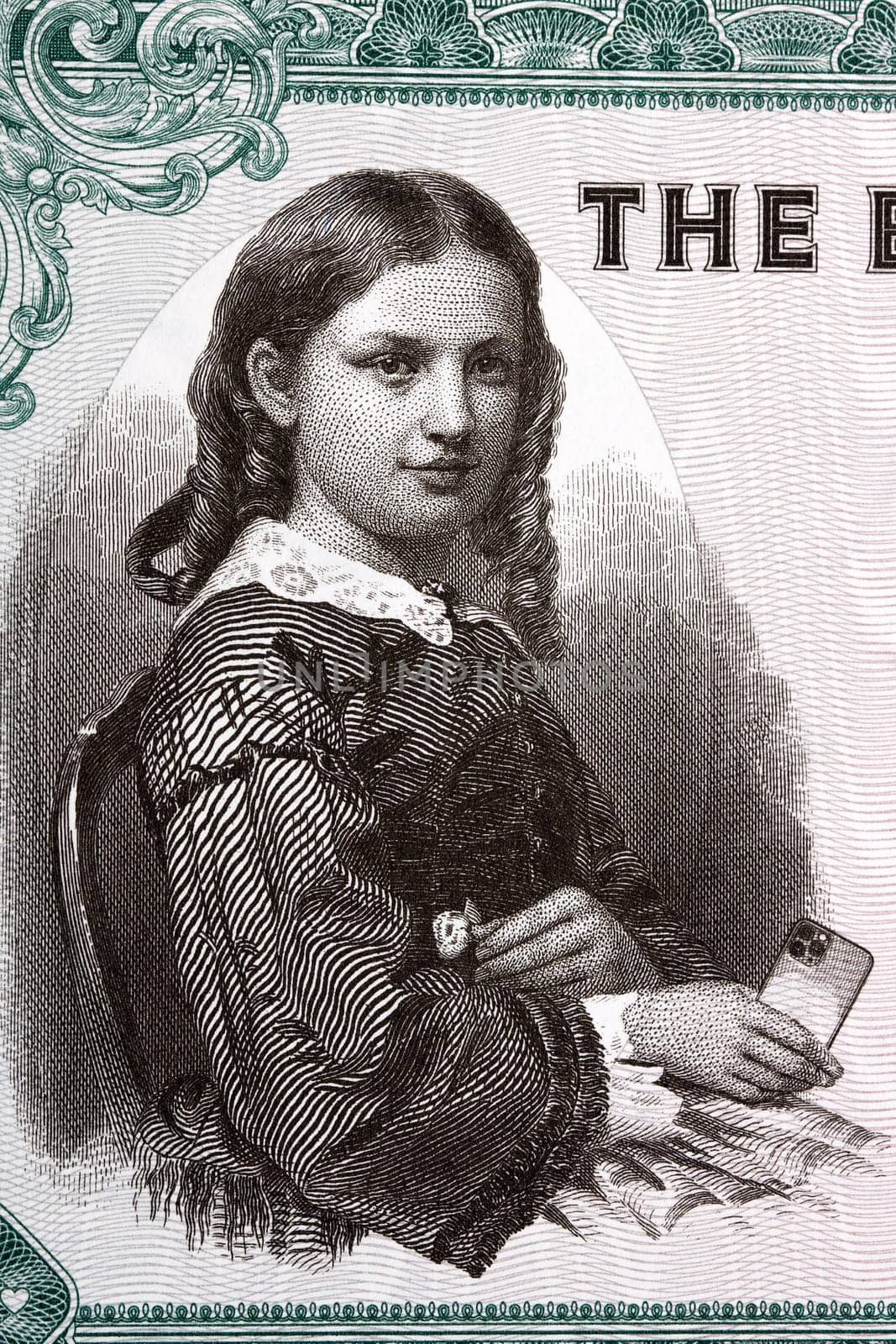 Girl with a mobile phone in her hand from money