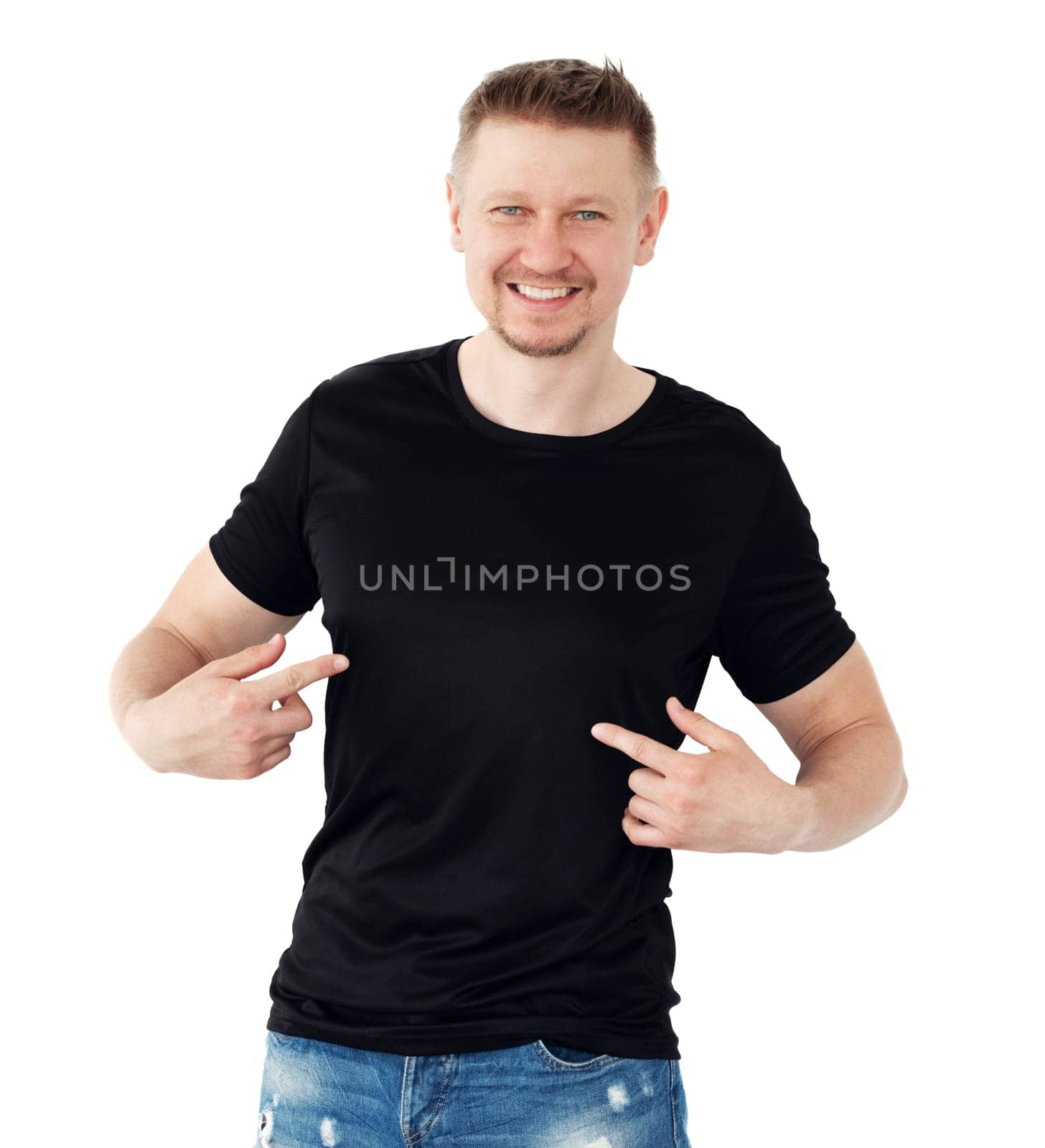 Man in a black T-shirt isolaled on a white background, finger point. Blank for your design