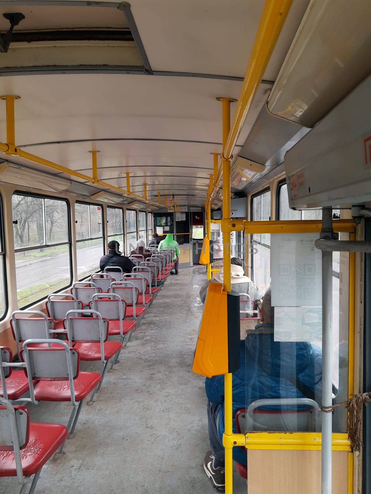 In the city tram during a trip around the city. View from the back of the tram.