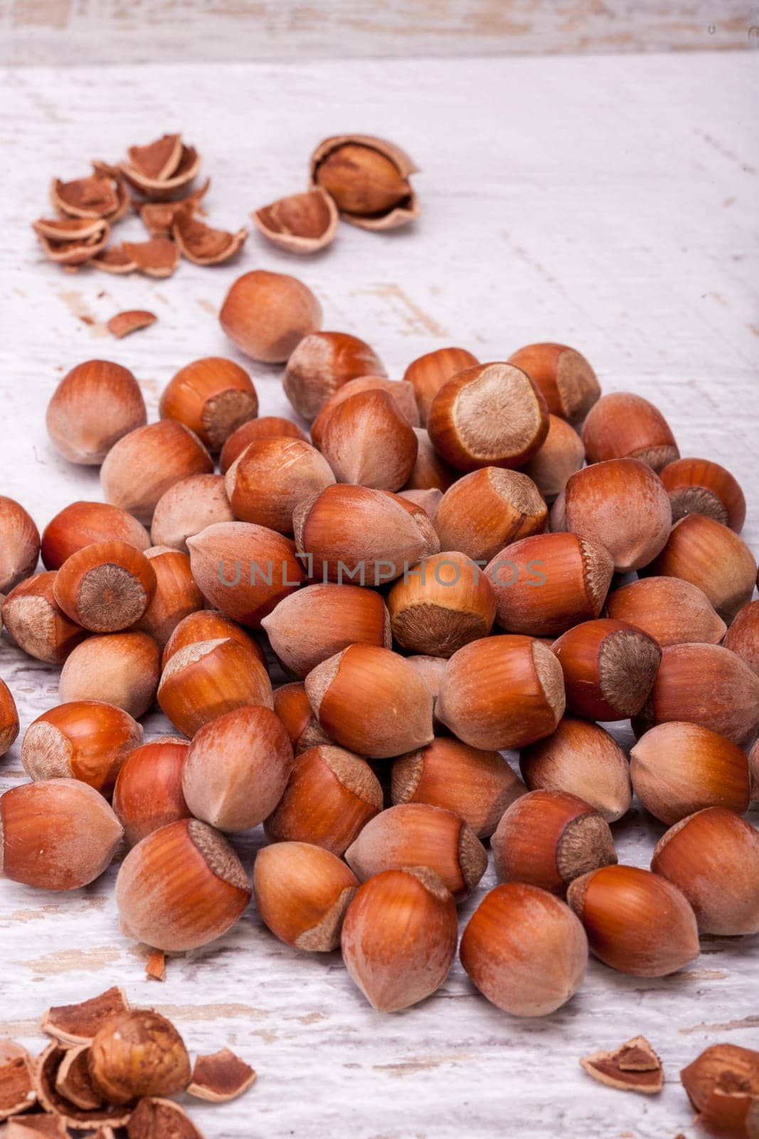 Close up photo of raw nuts by DCStudio