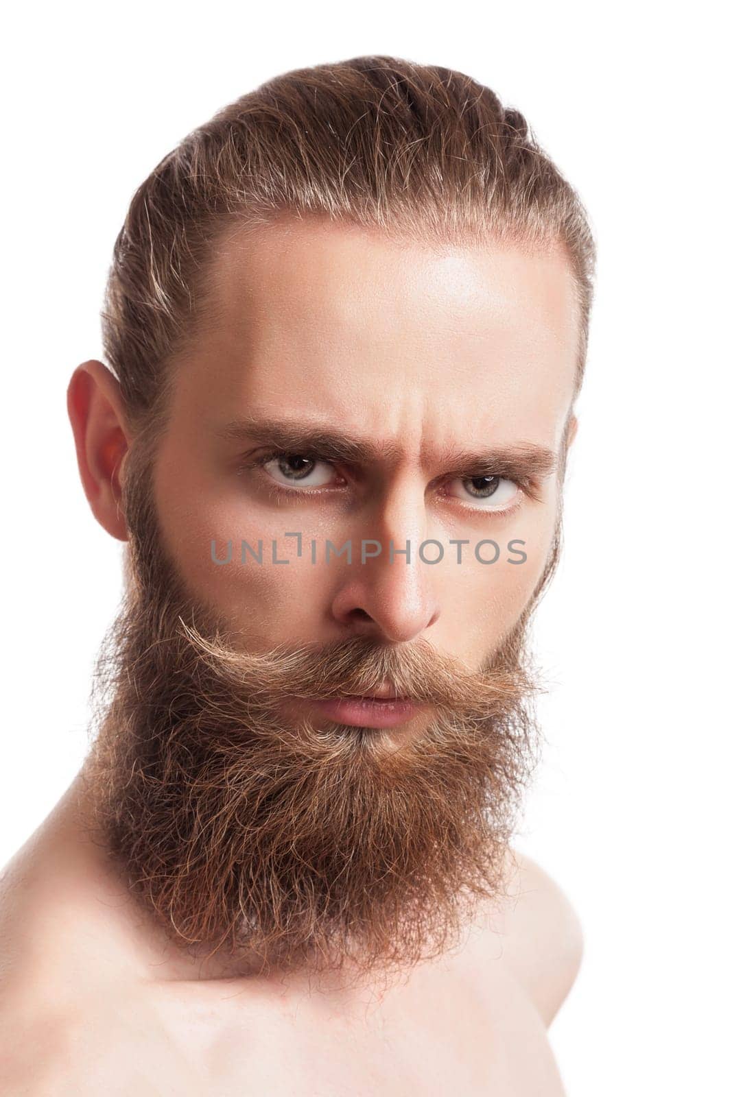 Bearded hipster looking at camera on white background by DCStudio