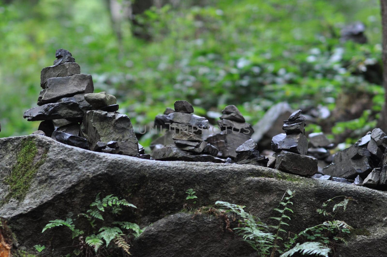 Closeup shot of quarry stones stacked in balance in the Oker valley in the Harz mountains in Germany