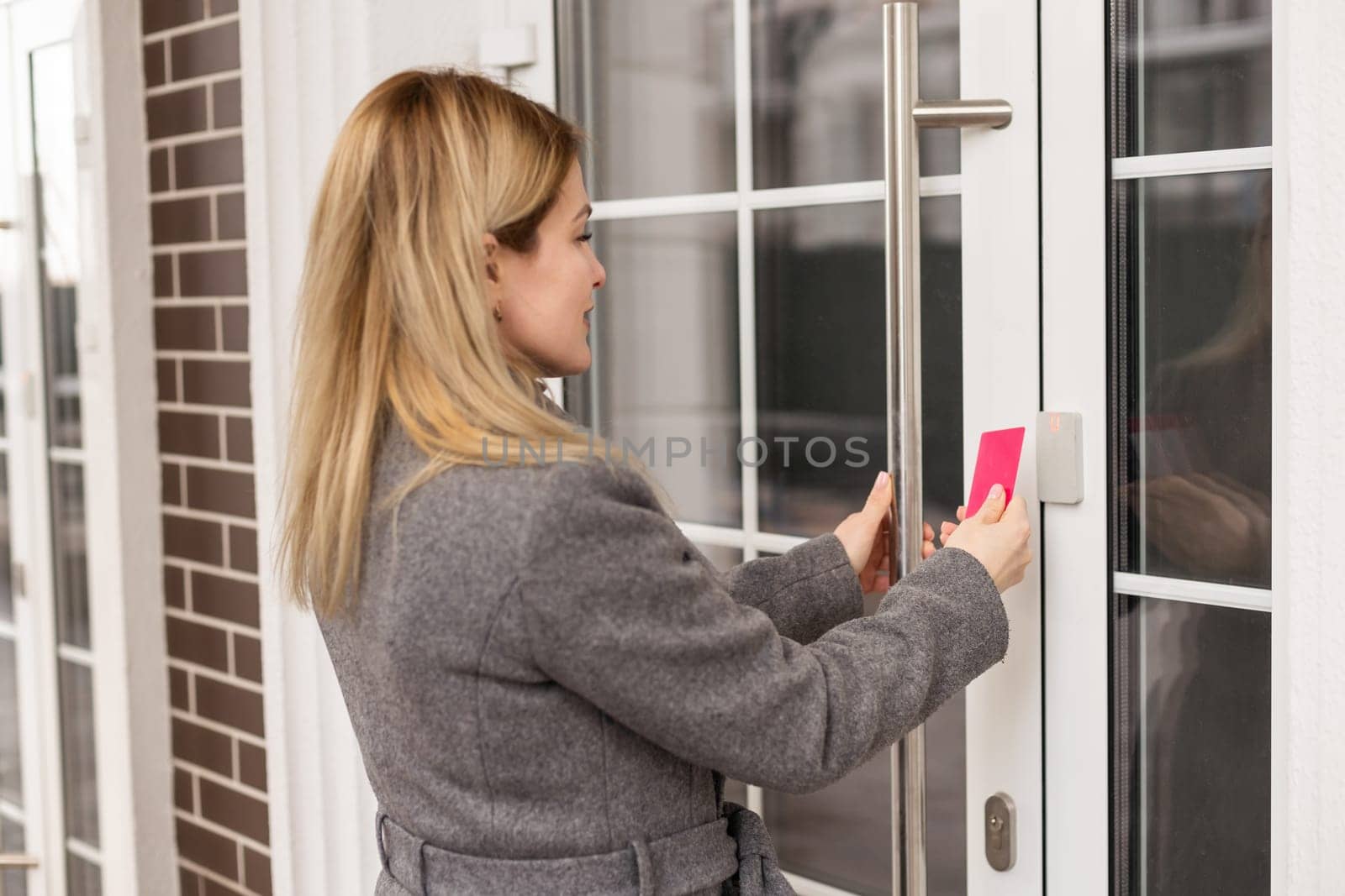 Key card with female hand.