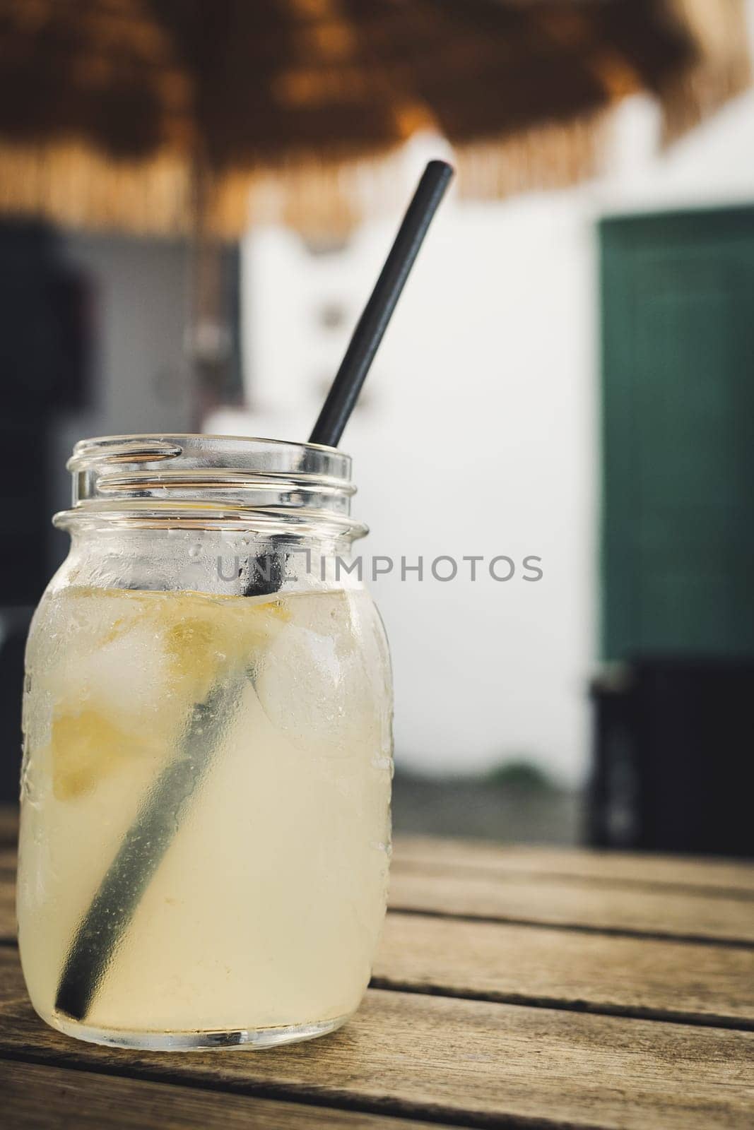 Vertical shot of a jar with homemade lemon lemonade by kb79