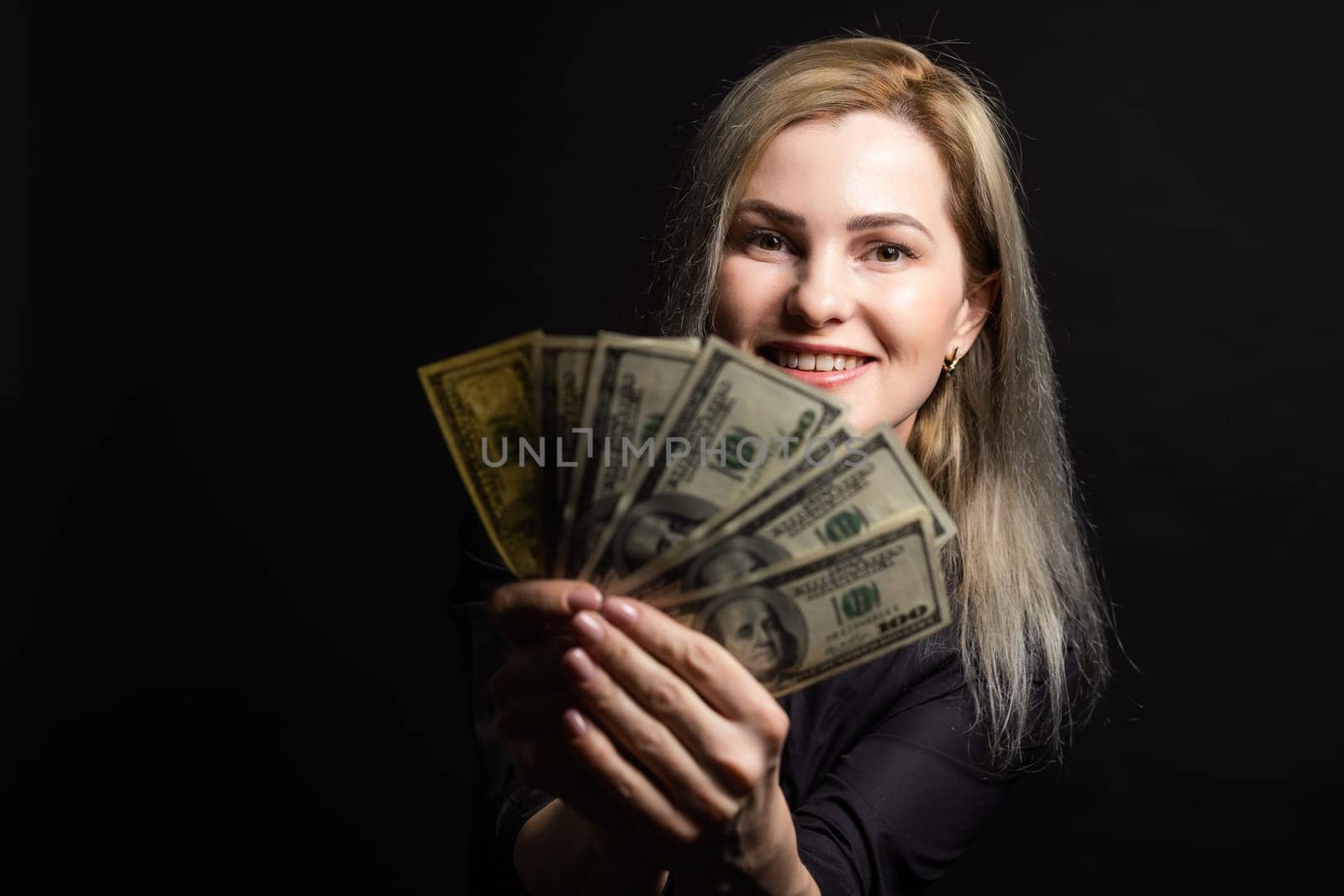 Business, finance and employment, entrepreneur and money concept. Successful young asian office manager, businesswoman showing earned cash, smiling satisfied as holding dollars. by Andelov13