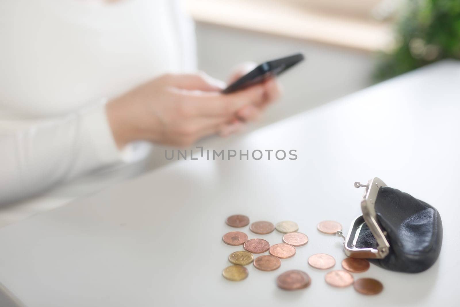 Bank, coins and mobile in tax files for financial year or consulting at work desk or at home. Economy, money and accountant working on corporate documents and administration for management. financial