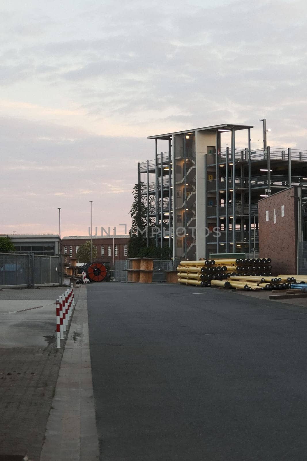 Construction site in front of a steel parking garage at the inner harbor of Muenster, Germany