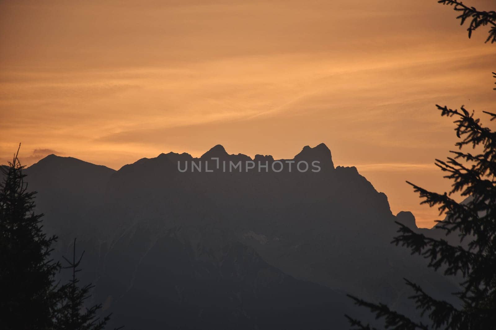 Beautiful landscape of the Leogang Mountains silhouette in Salzburg, Austria, at sunrise