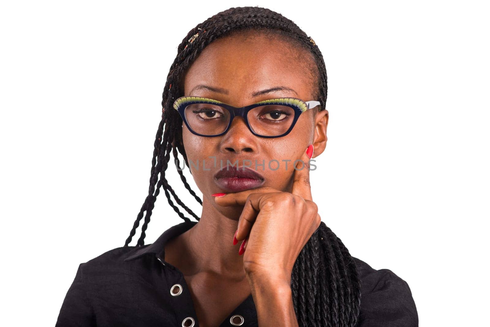 young african woman in glasses isolated on white background looking at the camera sadly.