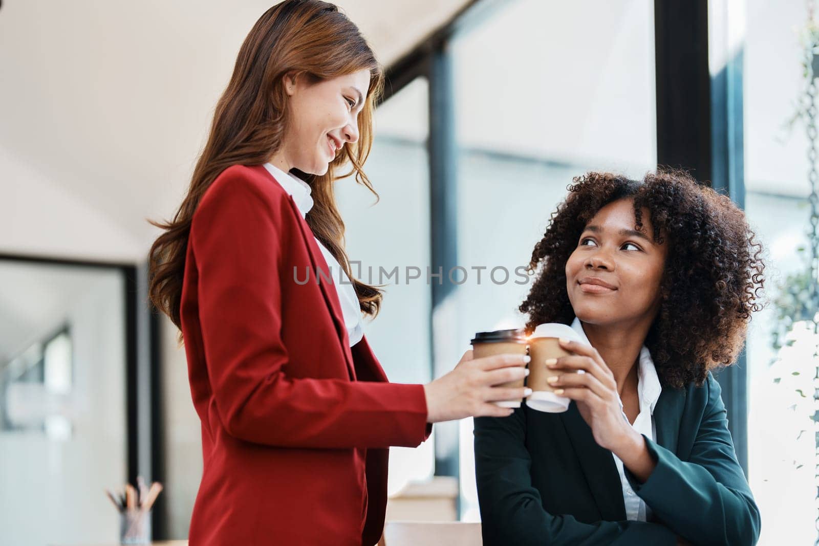 Multiethnic business, Beautiful American African and asian businesswoman people meeting coffee break, Accountant people do document, tax, exchange, accounting, Financial and discussion advisor by Manastrong