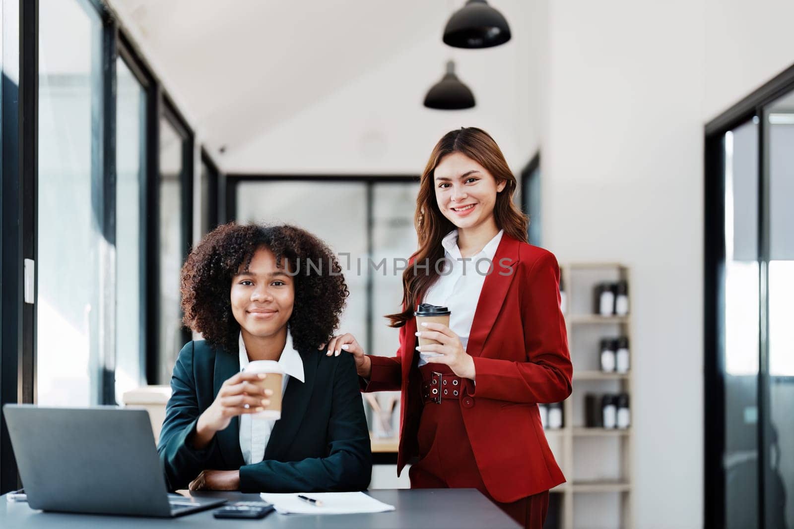 Multiethnic business, Beautiful American African and asian businesswoman people meeting coffee break, Accountant people do document, tax, exchange, accounting, Financial and discussion advisor by Manastrong