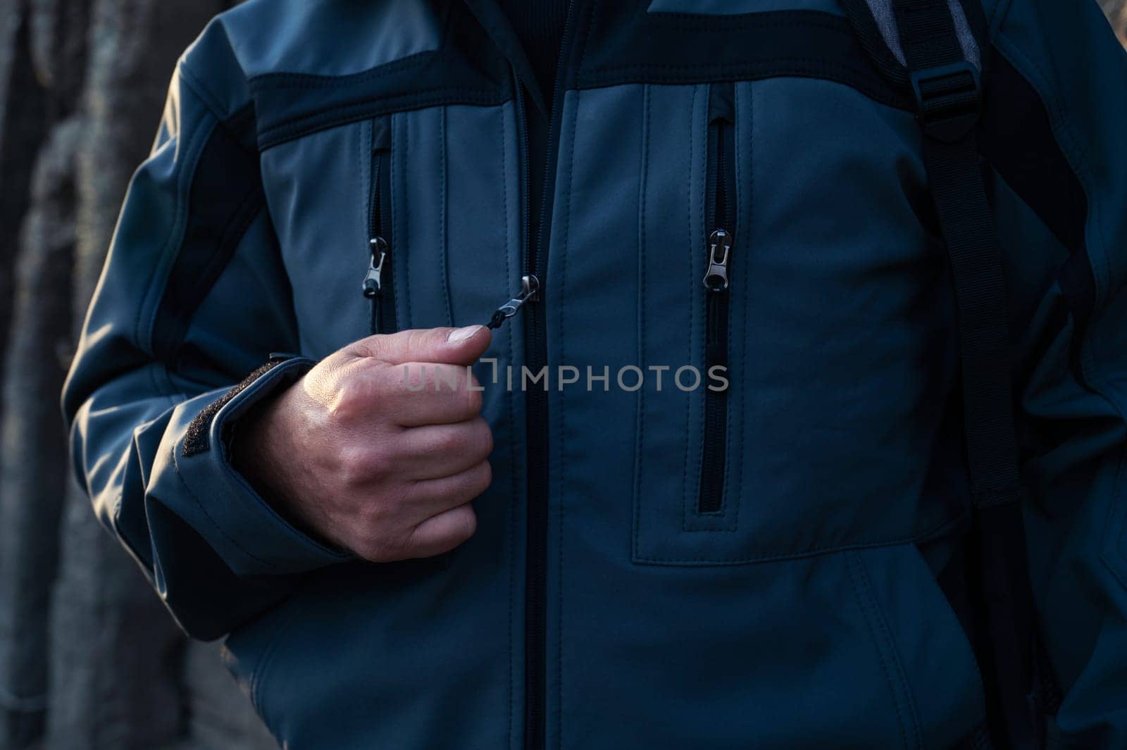 Man tourist standing in military outfit outdoor. Travel or military concept