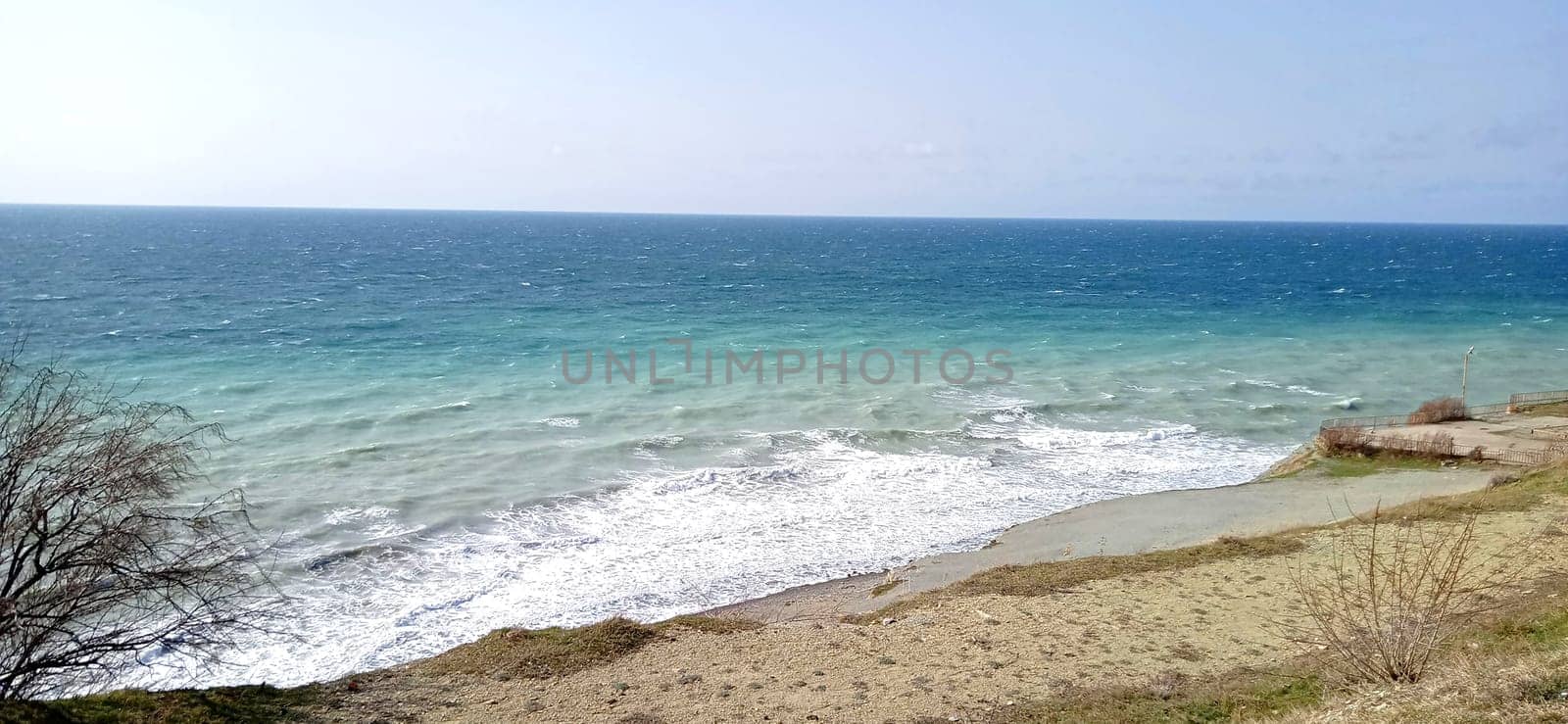 Soft wave of the sea on the sandy beach by fireFLYart