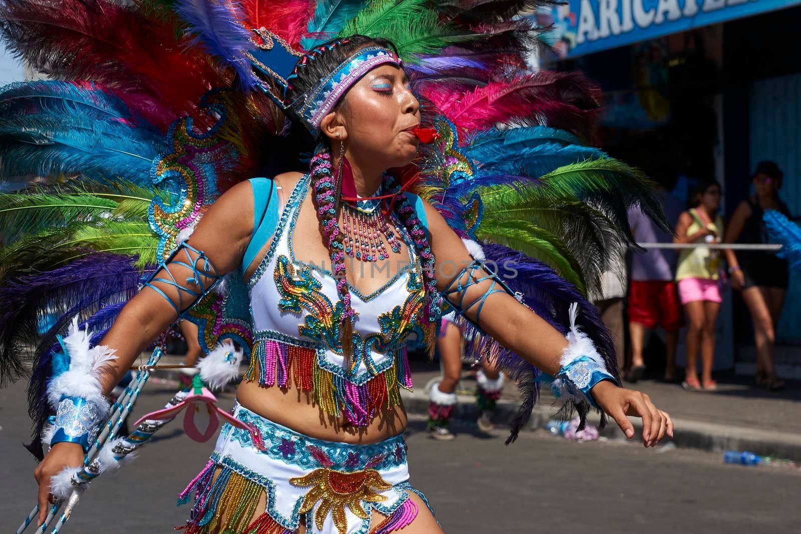 Arica, Chile - January 23, 2016: Tobas dancers in traditional Andean costume performing at the annual Carnaval Andino con la Fuerza del Sol in Arica, Chile.