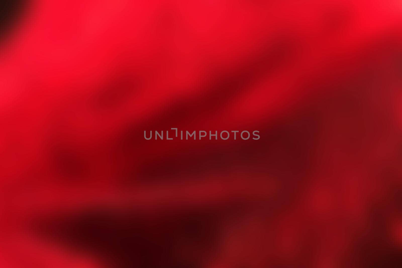 Red folds, abstract blurred background for text, soft fabric