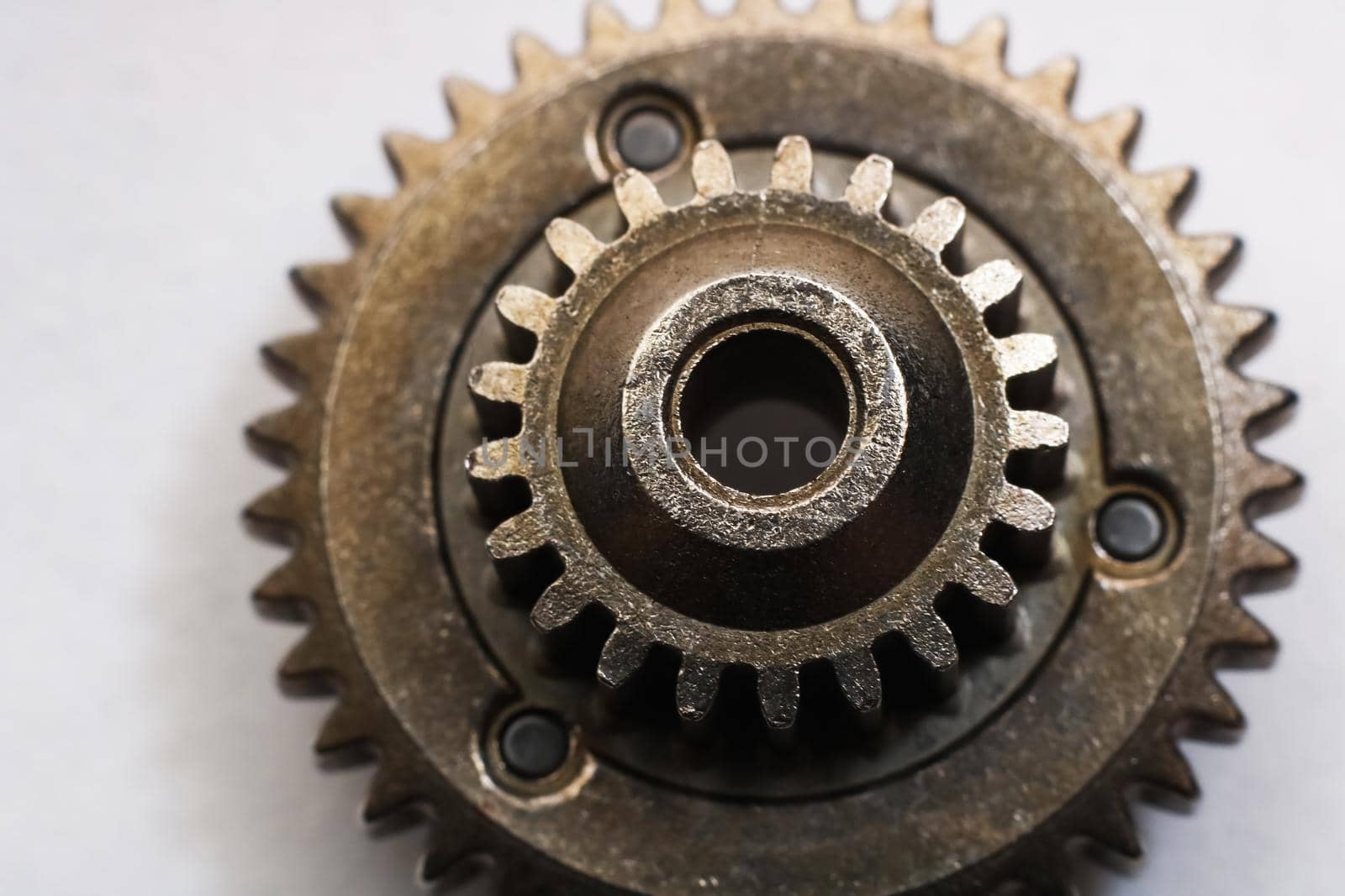 Gear close up on a gray background with copy space