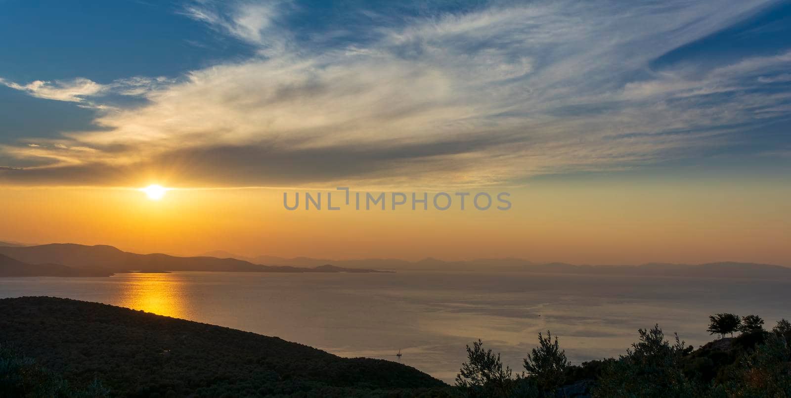 Beautiful sunset over the Aegean Sea in Pelion Peninsula, Greece.