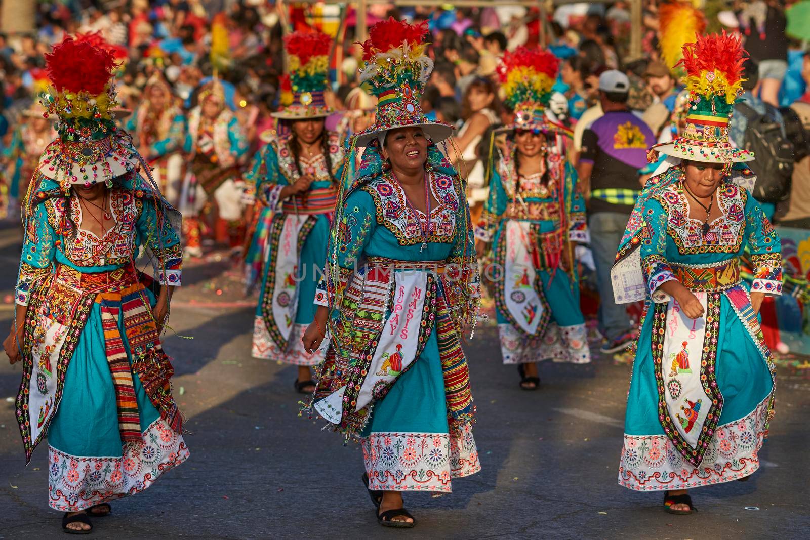 Arica, Chile - January 23, 2016: Tinkus dancing group in colourful costumes performing a traditional ritual dance as part of the Carnaval Andino con la Fuerza del Sol in Arica, Chile.