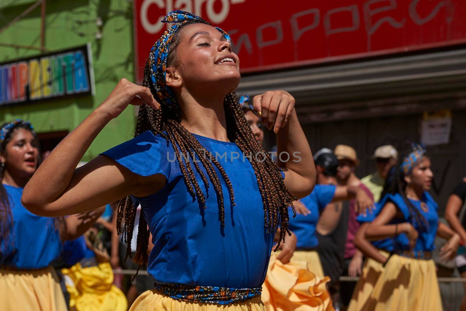 ARICA, CHILE - JANUARY 23, 2016: Group of dancers of Africa descent (Afrodescendiente) performing at the annual Carnaval Andino con la Fuerza del Sol in Arica, Chile.