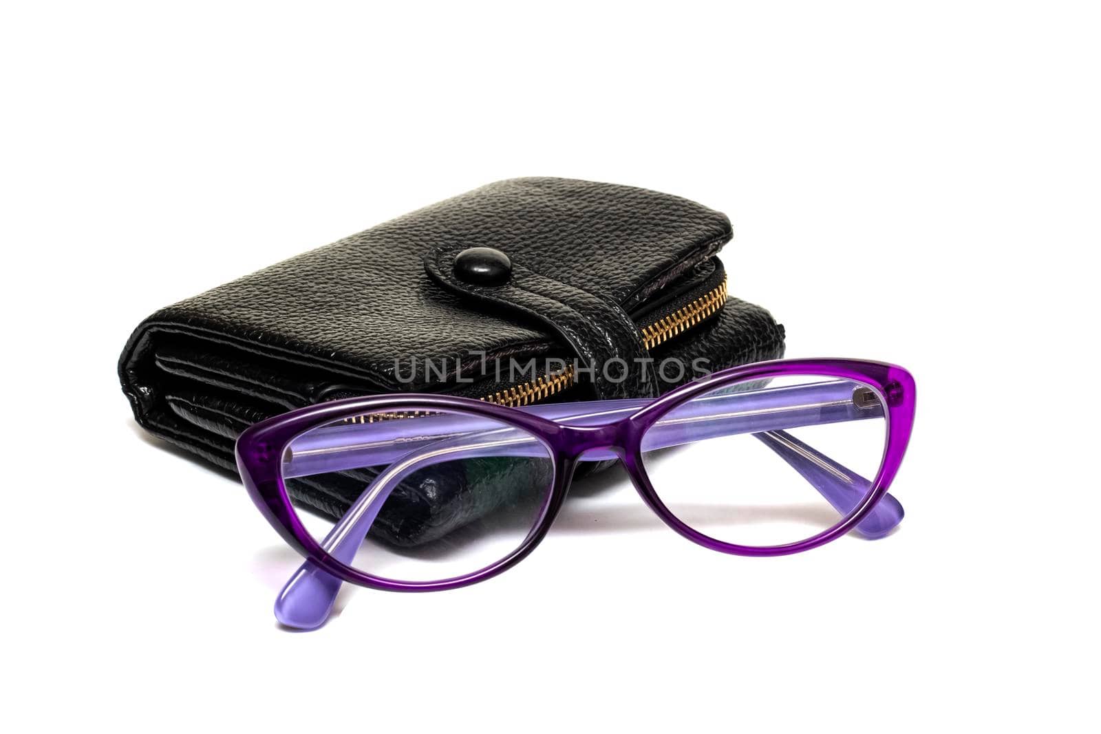 Black wallet and glasses isolated on a white background