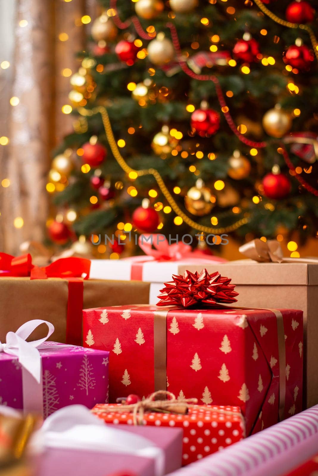 Different beautiful Christmas presents under the Christmas tree