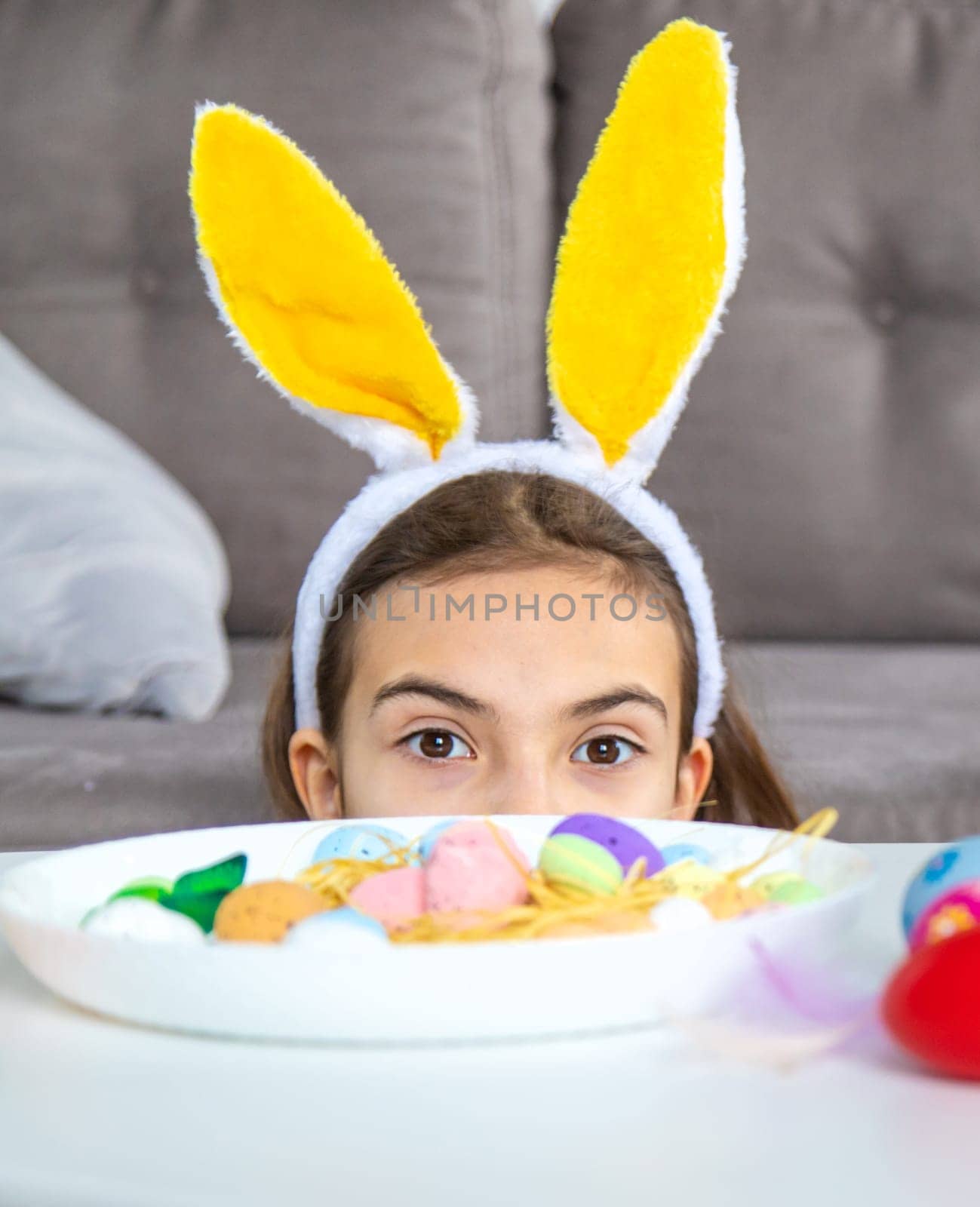 Happy Easter kid with eggs. Selective focus. Child.