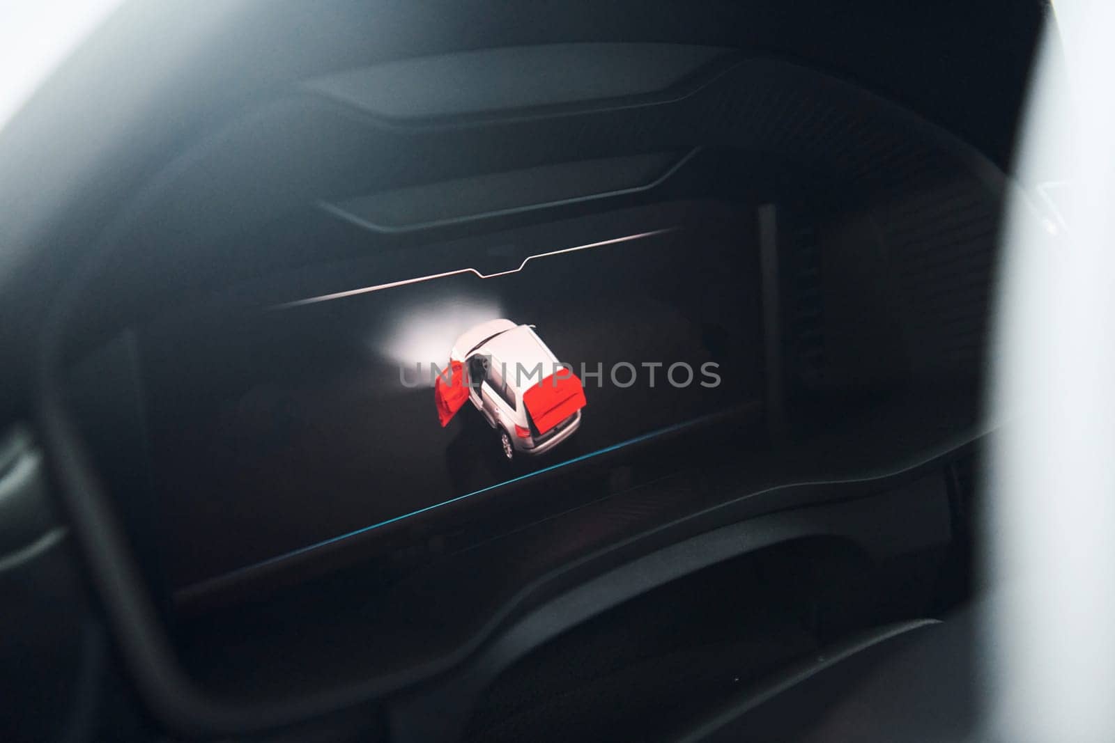 Display that shows which door is opened. Close up focused view of brand new modern black automobile.
