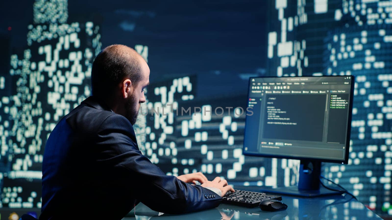 Male manager working on computer in skytower space, checking data on screen in corporation department office. Business employee sitting at desk in premium urban building, skyscraper city lights.