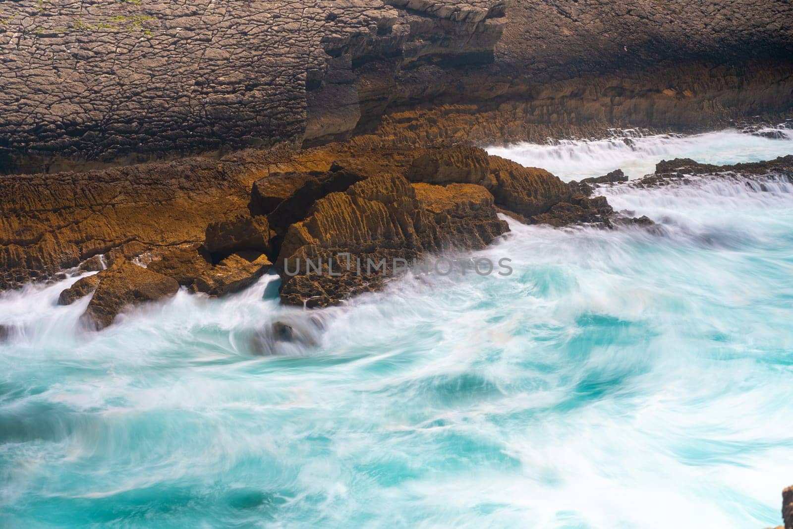 Atlantic ocean. Stormy summer day Big sea wave on rocky beach. Beaty in nature. Dramatic sea view. Long exposure