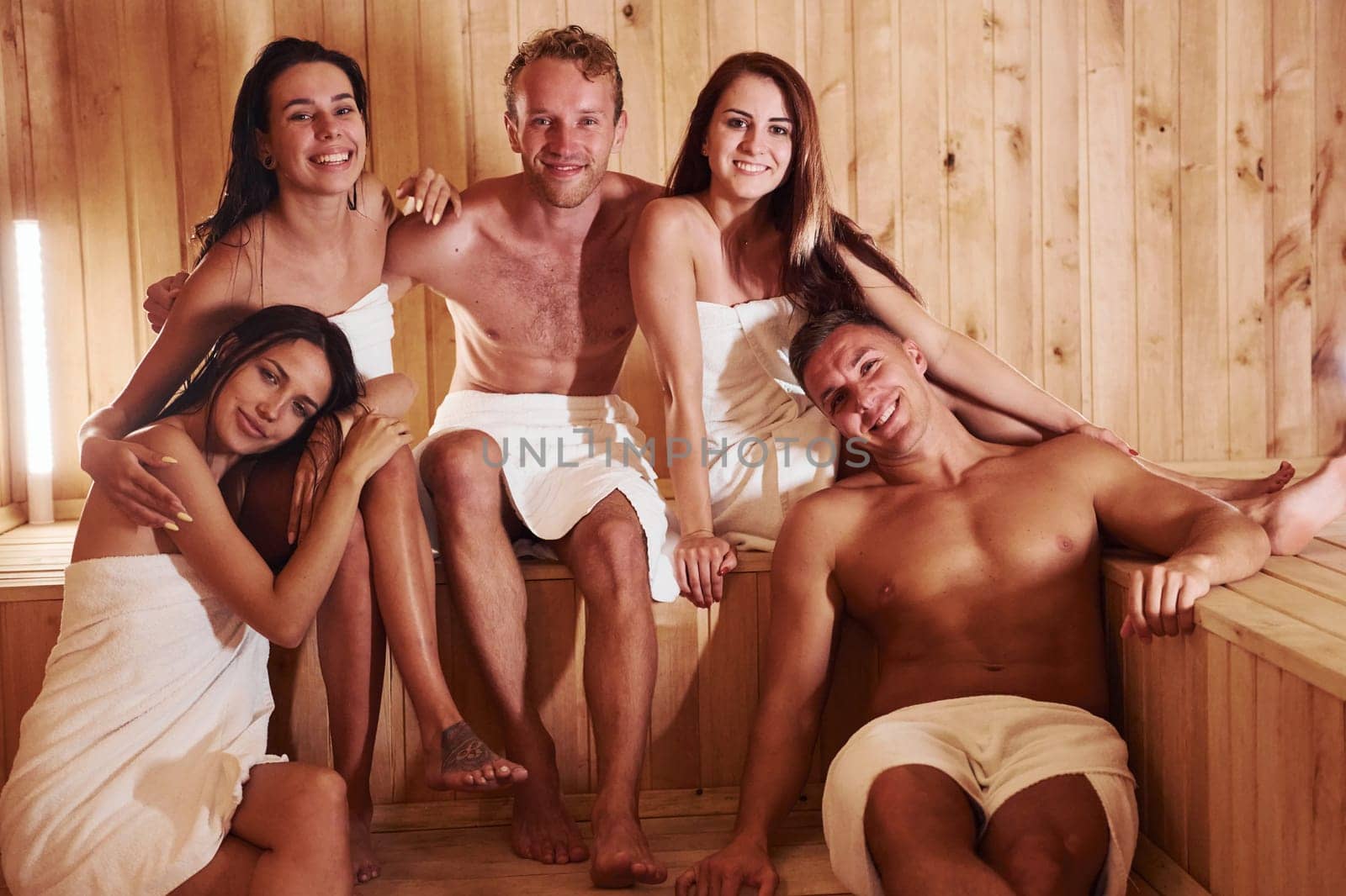 Group of young people together in sauna. Conception of vacation and weekend by Standret